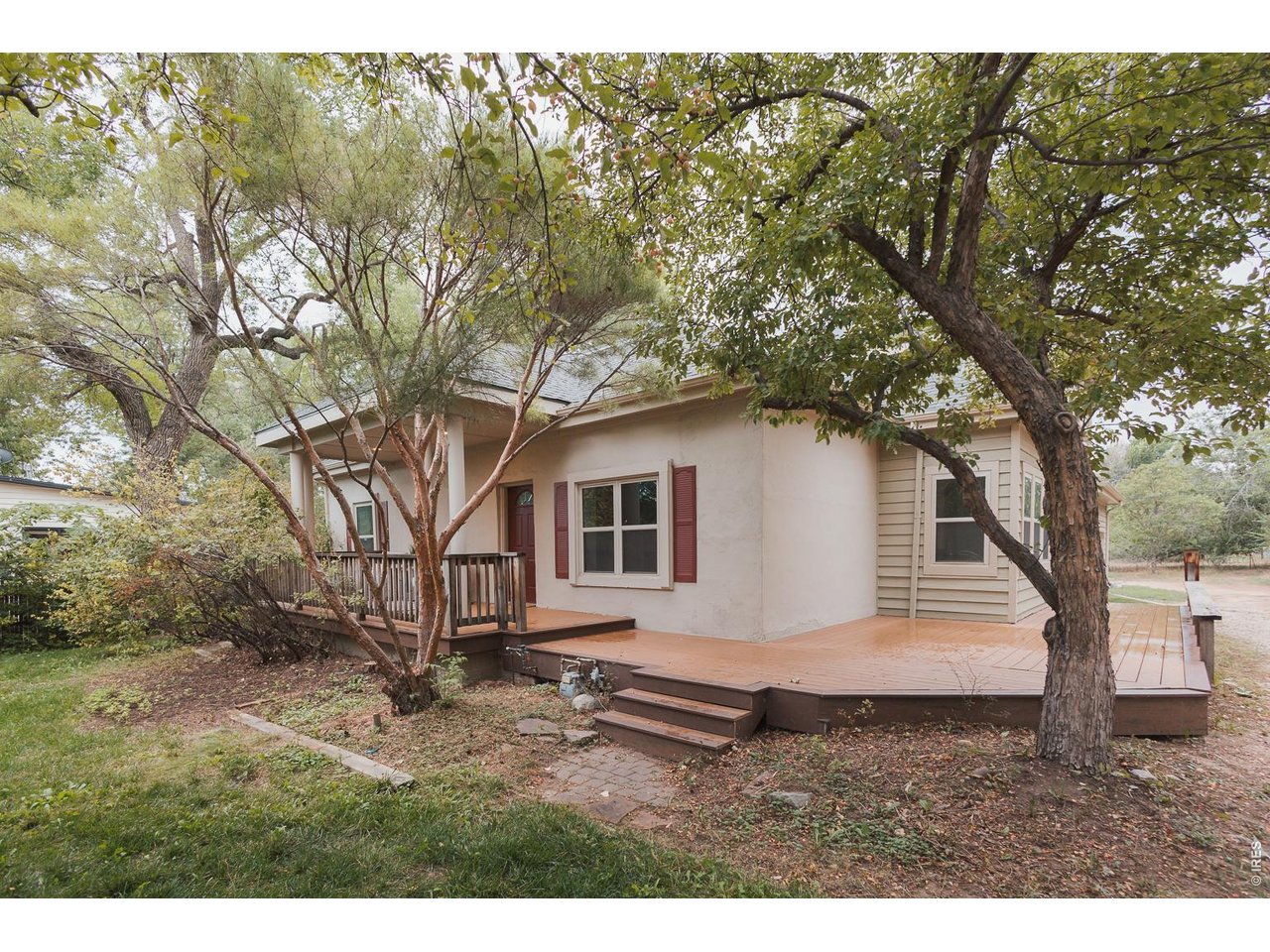 A rare opportunity to own a half-acre in town. Situated on an expansive 26,500-square-foot lot, 1505 S Shields offers a unique combination of move-in-ready living and long-term potential.Recent improvements include fresh interior paint, refinished hardwood floors, new carpeting in the bedrooms, basement and upper living room, updated lighting and bathrooms, a new roof in 2023, solar panels, heat pumps, and added interior insulation-all completed within the past five years.The home features three spacious bedrooms, three bathrooms, a large finished basement with separate exterior access, and a sun-filled second-story living room.Ready for its next chapter, the property offers room to imagine an addition, carriage house, urban farm, multifamily use, or an entirely new vision. There may also be an opportunity to assemble additional neighboring parcels. Consult the agent for information regarding other properties currently available.Emily Heinz: A rare opportunity to own a half-acre in town. Situated on an expansive 26,500-square-foot lot, 1505 S Shields offers a unique combination of move-in-ready living and long-term potential.Recent improvements include fresh interior paint, refinished hardwood floors, new carpeting in the bedrooms, basement and upper living room, updated lighting and bathrooms, a new roof in 2023, 7.2 kw/h solar panels in 2024, a new heat pump, and added interior insulation-all completed within the past five years.The home features three spacious bedrooms, three bathrooms, a large finished basement with separate exterior access, and a sun-filled second-story living room.Ready for its next chapter, the property offers room to imagine an addition, carriage house, urban farm, multifamily use, or an entirely new vision. There may also be an opportunity to assemble additional neighboring parcels. Consult the agent for information regarding other properties currently available.