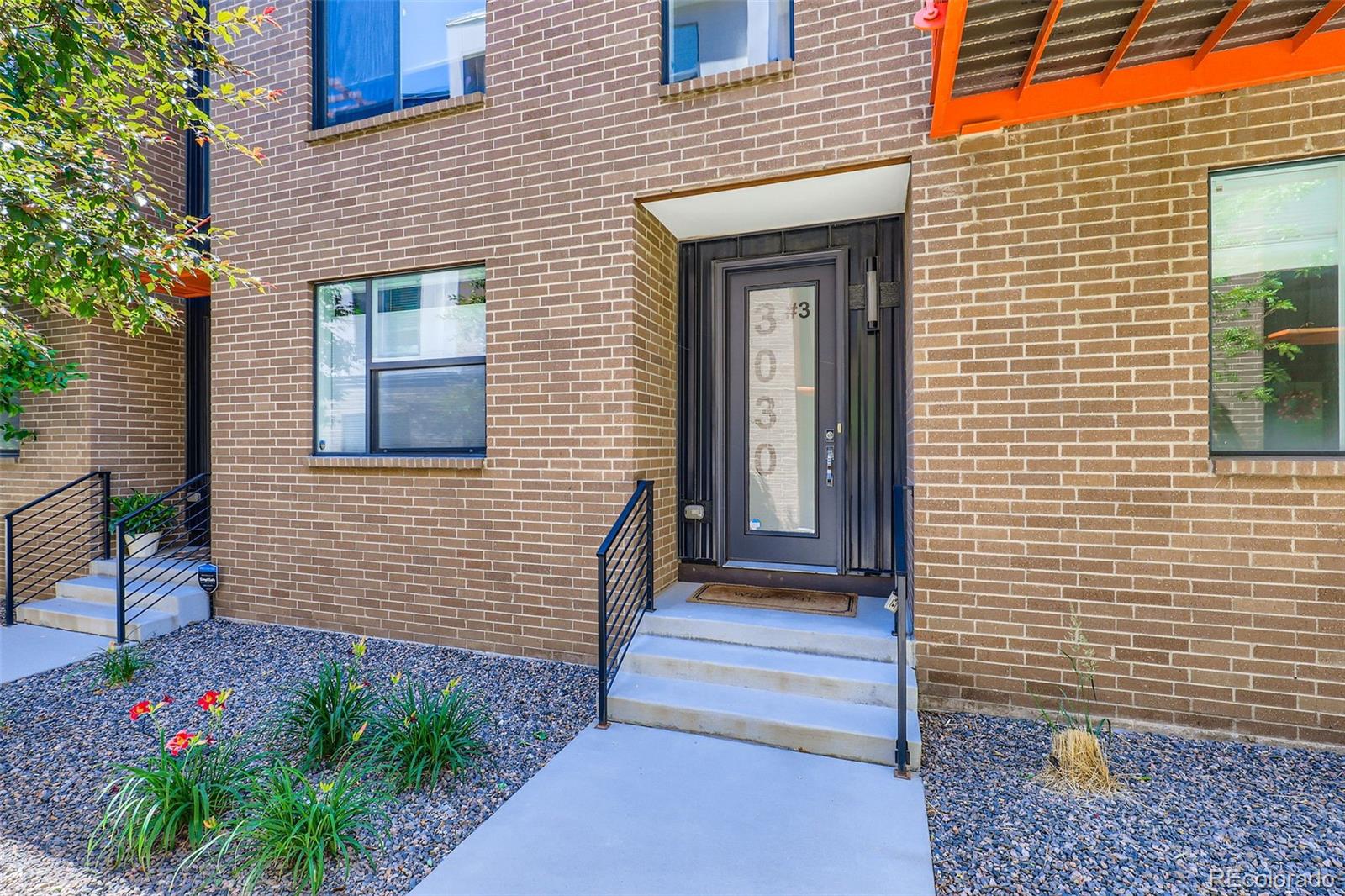 Urban Contemporary Townhome with Stunning Rooftop Views!
Experience the best of city living in this sleek and stylish 2-bedroom, 2-bathroom urban contemporary townhome. Spanning three levels with a private partially covered rooftop deck, this home offers panoramic southwest-facing views of the city skyline and the Front Range—complete with gas and water hookups, making it perfect for entertaining or relaxing under Colorado skies.
Inside, you’ll find high-end finishes throughout, including an upgraded kitchen with quartz countertops, premium appliances, a gas range, designer lighting and elegant wood flooring. The open-concept main level features an electric fireplace that adds warmth and style to the living space.
The thoughtful layout includes a private entry-level bedroom with en-suite 3/4 bath—ideal for guests or a home office. Upstairs, the spacious primary suite features a full bath, a wall safe, and a convenient stackable washer and dryer.
Additional highlights include a two-car attached garage with storage area, (fully drywalled), a tankless water heater, and low-maintenance living with contemporary comfort in mind.
Located just minutes from City Park, the Denver Zoo, the Museum of Nature & Science, RiNo, Cherry Creek, and downtown Denver—enjoy endless access to top dining, shopping, and entertainment.
Don’t miss this rare opportunity to own a lock and leave  modern home with stunning views and unbeatable location.