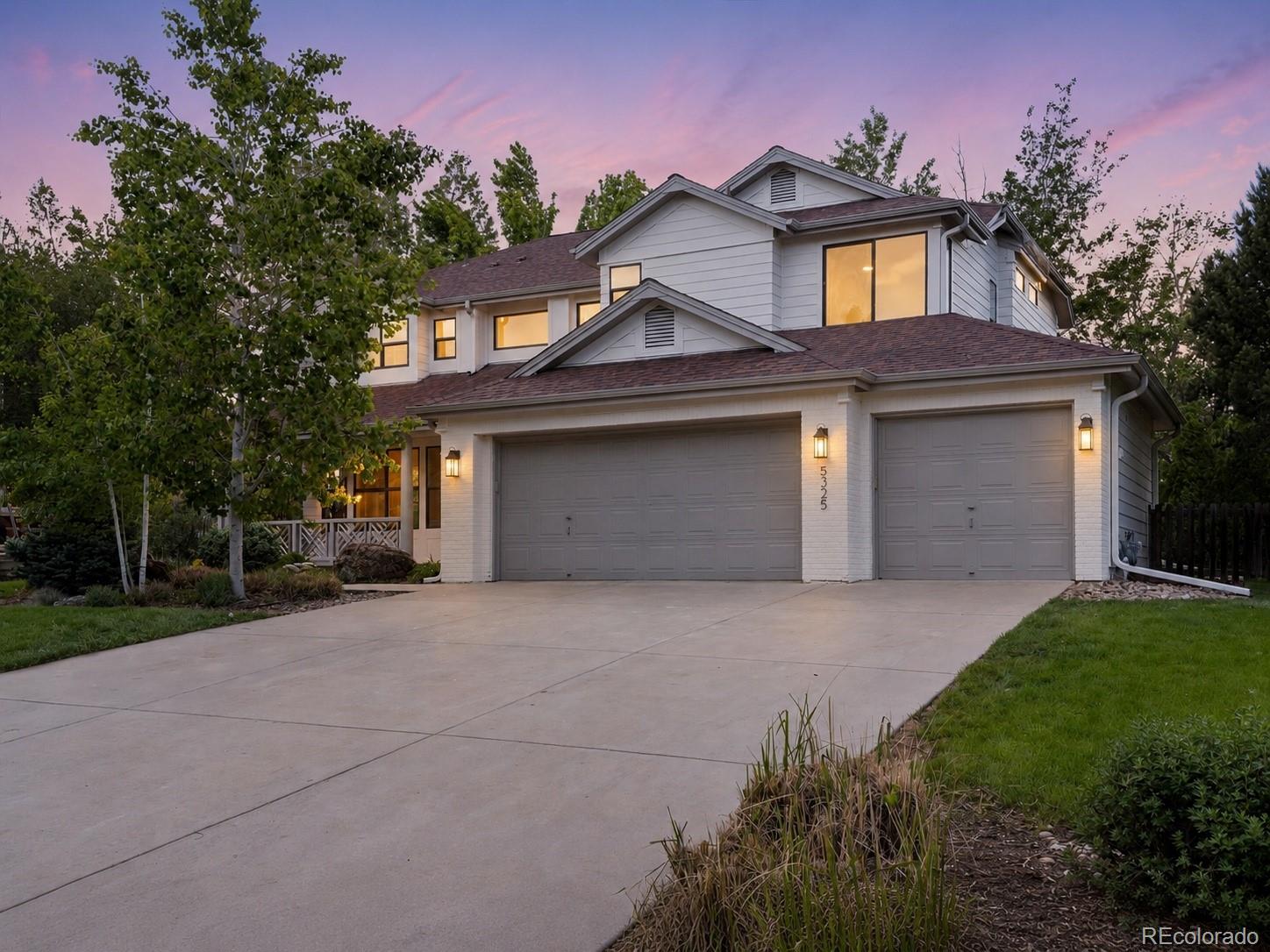 5325 Pinehurst is a rare Boulder Country Club offering with the scale, finish level, and layout today’s luxury buyer is looking for. Fully updated and thoughtfully designed, this 7-bedroom, 5-bath home sits on nearly one-third of an acre and delivers exceptional flexibility across three finished levels.The main level features soaring ceilings, walls of natural light from brand-new windows throughout, hardwood floors, and a dramatic limewashed fireplace that anchors the great room. The open-concept kitchen is built for everyday living and elevated entertaining, with Monogram luxury appliances, a gas range, expansive cabinetry, a large walk-in pantry, and a kitchen-to-deck pass-through window that creates a seamless indoor-outdoor hosting experience.A main-level bedroom with an adjacent walk-in shower offers ideal flexibility for guests, work-from-home needs, or multi-generational living. Upstairs, the home continues with four bedrooms and three full baths, including a private primary suite with a European-inspired wet room featuring a shower and soaking tub combination, plus a walk-in closet with custom built-ins. An additional upstairs bedroom includes its own ensuite bath, while two more bedrooms are connected by a Jack-and-Jill bathroom.The finished basement boasts two additional bedrooms, another bathroom, a wet bar, and a generous secondary living area. Whether used for movie nights, hosting, fitness, recreation, or extended-stay guests, this level adds meaningful function to an already substantial floor plan.Outside, the nearly one-third acre lot offers mature trees, a large deck, an even bigger yard, and a truly peaceful setting. Community amenities include a clubhouse, pool, tennis courts, golf course, and all the best living in Boulder Country Club.