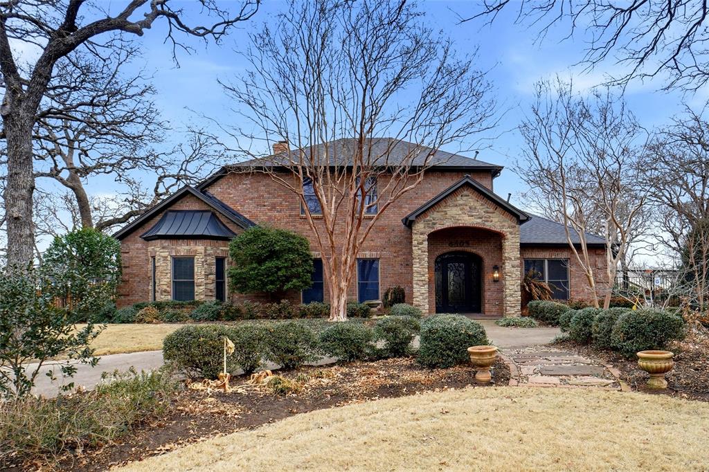 First time ever on the market, this one of a kind estate is set on an extraordinary 1 acre homesite in the coveted Jewel Estates Addition of Colleyville. Offering approximately 3,200 square feet, the home is thoughtfully designed for those seeking to right-size their living space without sacrificing comfort, quality, or lifestyle. A circular governor’s driveway creates a grand sense of arrival, immediately setting the tone for the privacy, beauty, and distinction found throughout this master gardener’s oasis with magazine worthy gardens an outdoor enthusiast’s paradise. Surrounded by mature trees and lush, meticulously designed landscaping, the home feels like a private retreat with privacy everywhere you look. The expansive grounds showcase carefully curated plantings and outdoor spaces that feel both refined and serene, truly worthy of editorial admiration. Inside, the home offers well proportioned living spaces, including a versatile flex space ideal for a home office or additional living area, allowing the home to adapt effortlessly to your lifestyle. The well-appointed bedrooms provide comfort and privacy, creating inviting personal retreats for both family and guests. The backyard is a destination in itself, featuring multiple sitting and gathering spaces perfect for entertaining or quiet moments of relaxation. An outdoor living area with fireplace and a fully equipped outdoor kitchen create the ideal setting for year round enjoyment, while the huge resort style pool is beautifully integrated into the landscape, offering a peaceful and secluded escape. Completing this exceptional property are a dedicated greenhouse and a separate garage, workshop, ideal for gardening enthusiasts, hobbyists, or additional storage needs. Rare, private, and impeccably designed, this remarkable property is more than a home it’s a lifestyle. A once in a generation opportunity in Colleyville’s Jewel Estates Addition, where timeless living space meets exceptional outdoor living.