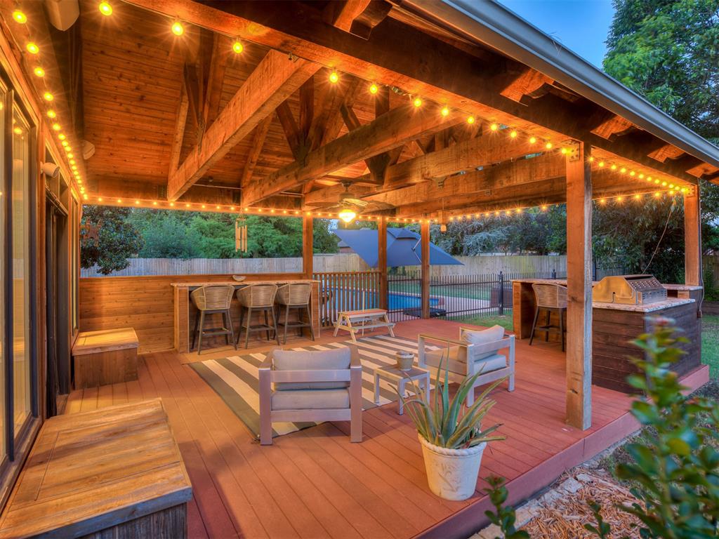 Exquisitely remodeled in 2022, this stunning home in the quiet, gated Crystal Lakes community offers both functionality and comfort. Situated on a spacious 0.5-acre lot, this property features 4 true bedrooms, 3.5 baths, 3 versatile living areas, and a 3 car garage. Step inside to discover an open-concept main living and kitchen area—perfect for hosting gatherings or relaxing in everyday comfort. The chef’s kitchen has two large islands, built-in 6-burner gas range, abundant cabinet and counter space, and two dining areas. The primary suite is located on the lower level and showcases a spa-like en suite primary bathroom, complete with beautiful marble countertops, a double vanity, and a grand size walk-in shower. Two additional bedrooms are positioned on the opposite side of the home and feature a true Jack-and-Jill setup with walk-in closets. Abundant natural light flows to the main living areas through large windows, creating a warm and inviting atmosphere. A large multi-purpose living room upstairs has a built in screen and projector, perfect for movie nights. It also offers a nook for reading and additional space for playing board games or exercising. Enjoy your morning coffee or family dinners in your dining area with beautiful backyard views. Step outside to your own private retreat, featuring a securely gated pool area and exceptional outdoor living space, perfect for enjoying sunny days, gatherings with friends, and grilled food. The neighborhood is serene and surrounded by mature trees, perfect for walking or biking through its peaceful streets. You can really feel a strong sense of community and scenic surroundings that naturally invite outdoor recreation.