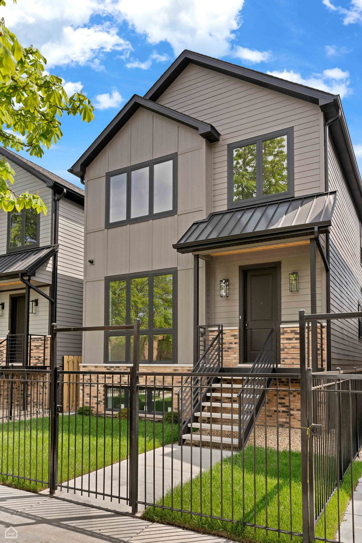 Exceptional New Constuction by ID Homes.  Nestled between 2 New construction homes on Tree Lined Drake Ave,  this New Construction home is 4000sq ft spanning 3 finished levels with Luxury Features, Modern Finishes and Design. All the features in New Construction you are looking for: Thermador Pro Appliance package (42" Fridge!), Quartz backsplash and Waterfall Island, Wine and Beverage Cooler, White Oak Hardwood throughout 1st and 2nd floors, Exterior Hardwired Camera System, Custom Closets, Beams and Accent Walls, Mudroom with built out bench. Great Room sizes, Flow and Natural Light. 4 BEDROOMS ON SECOND FLOOR - including expansive Primary with Luxury Bath. 2nd Floor Laundry.  Fresh Dark Gray Hardie Board Siding and Chicago Common Brick Exterior with custom metal stairs.    Fenced front and back yard, Paver patio, Finished Roof Top Garage and landscape package. Exceptional Irving Park location close to everything - Schools, Restaurants, Independence Park, Downtown, Metra and Blueline. Beautiful Home!!