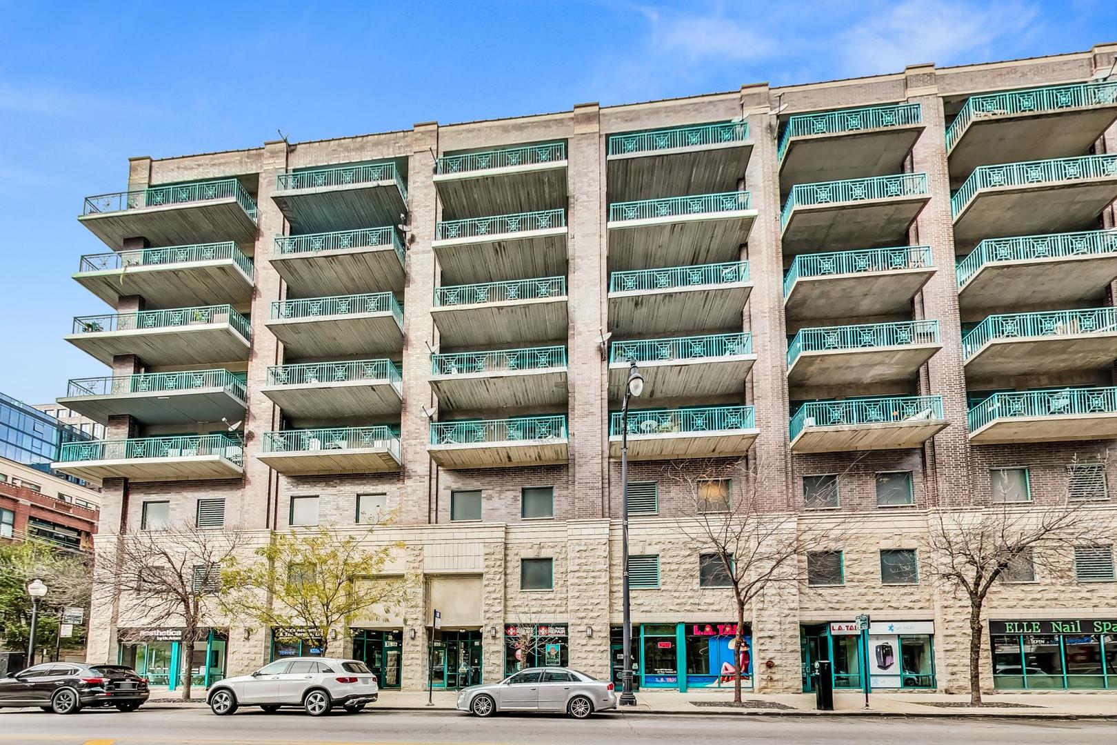 Step into your urban oasis in the heart of West Loop! This stunning condo boasts a recently redone kitchen with sleek 42" cabinetry and a show-stopping oversized waterfall island with quartz countertops - perfect for your next dinner party or cozy night in. The kitchen seamlessly opens into the living room, creating a spacious, open-concept vibe.  The 2nd bedroom features a stylish sliding glass wall off the living room, with an attached Murphy bed and direct access to the expansive 42 x 15 patio. This outdoor haven is ideal for entertaining, offering beautiful views of the vibrant West Loop neighborhood.  Enjoy newer hardwood flooring throughout the main living area, while the primary bedroom and living room are outfitted with luxury Hunter Douglas room-darkening roller shades for ultimate comfort. The primary suite includes an en-suite bathroom with a dual vanity and stone tile.  Additional, this unit includes an extraordinarily large 15' x 20' storage space. Garage parking is also included in the price, making city living that much easier.  Walking distance to all the best of West Loop/Fulton Market: trendy restaurants, coffee shops, parks, nightlife, Marianos, CTA bus routes, and the Green Line stop. It's also a short walk to the Loop or Union Station for easy commutes.