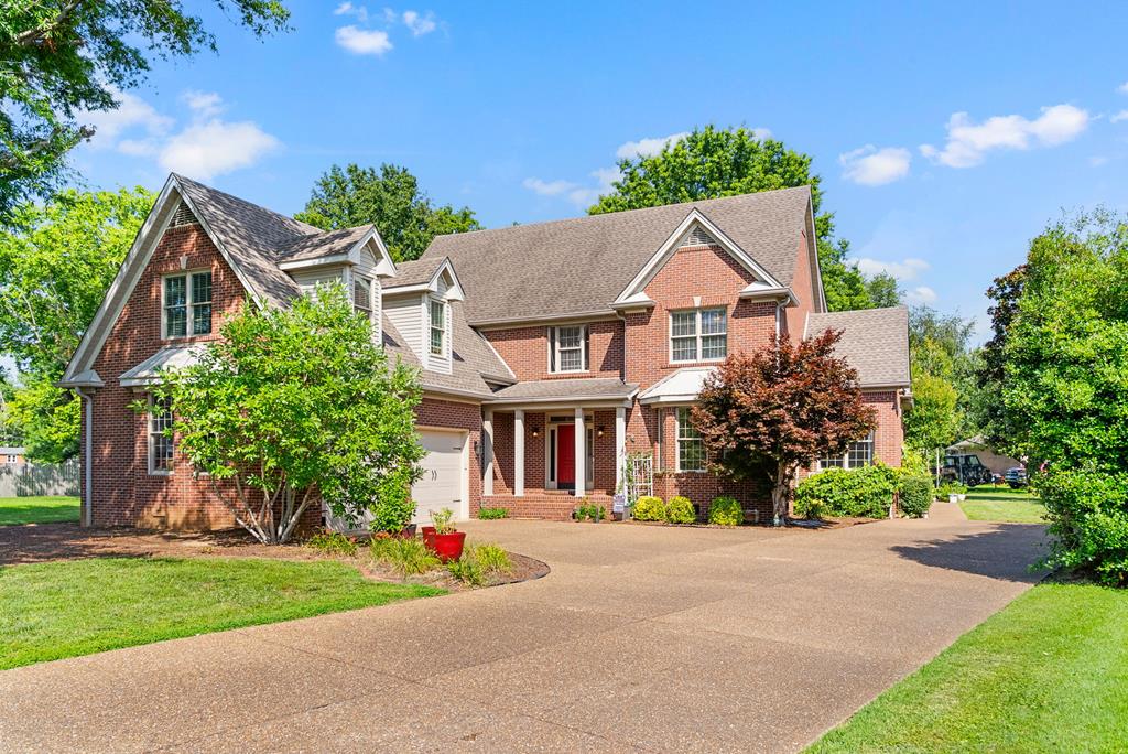 Spacious all-brick home tucked in a quiet cul-de-sac featuring 4 bedrooms (with potential for a 5th), 3 full bathrooms, and 2 half baths. This home offers a dedicated office, large kitchen with granite countertops, gas fireplace in the living room with built-ins, walk-in closets, and abundant storage throughout. Soaring vaulted ceilings, a convenient laundry chute from upstairs, and fresh interior paint in 2023 add to the appeal. Enjoy the outdoors with a patio framed by brick, a koi pond, and a half basketball court—perfect for entertaining or relaxing.