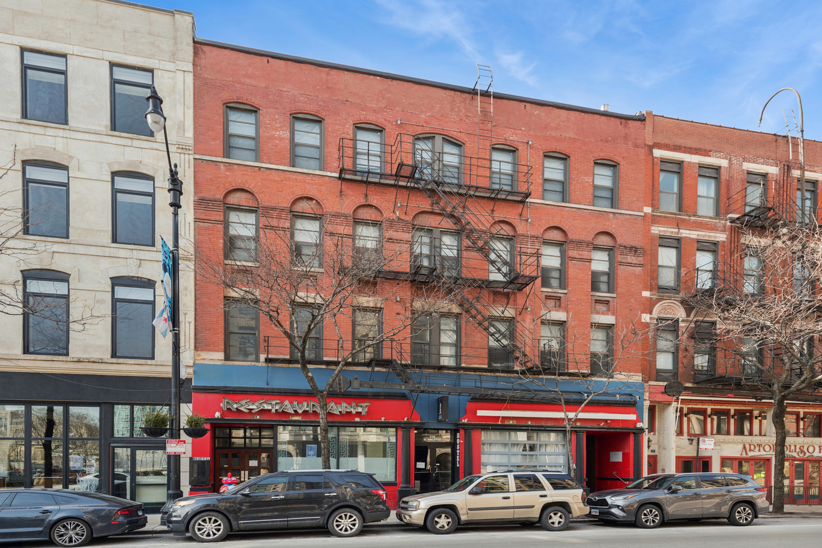 RARE OPPORTUNITY. Fully operational Hostel/Rooming house which has gone an extensive renovation that rivals a modest hotel accommodation. This is a four story building with full basement originally erected in 1864, pre-dating the Great Chicago Fire of 1871. First floor is a 5,000 square foot restaurant space, formerly the Parthenon Restaurant. Restaurant kitchen is completely intact and fully equipped, black iron exhaust, all equipment is operational for turnkey operation. The upper three floors are a European Hostel which have been completely gut renovated into contemporary luxury rooms, shared bathrooms. All rooms have modern, contemporary beds, linens, furniture, cell phone charging stations, locker storage or built in surface tables for desk areas or computer stations. Over 140 beds. Capital improvements include tuck pointing, complete west side brick wall replacement, tar coated rubber roof with silver coating, all copper plumbing, newer mechanical systems, some separation of gas, electric and water meters. Three huge hot water tanks. Housekeeping washer and dryers. Restaurant storage in full basement; cooler, abundant storage, specific liquor storage, freezer, two sump pumps. Sophisticated camera/security system throughout premises. RMS run booking/accounting system for hostel already built and turnkey for next user/operator. DX-5 ZONING. 6,250 land square feet. Building is 27,404 square feet. Real Estate taxes successfully have been contested and reduced. Ask for additional information on financials, P/L, reduced tax bill, etc.