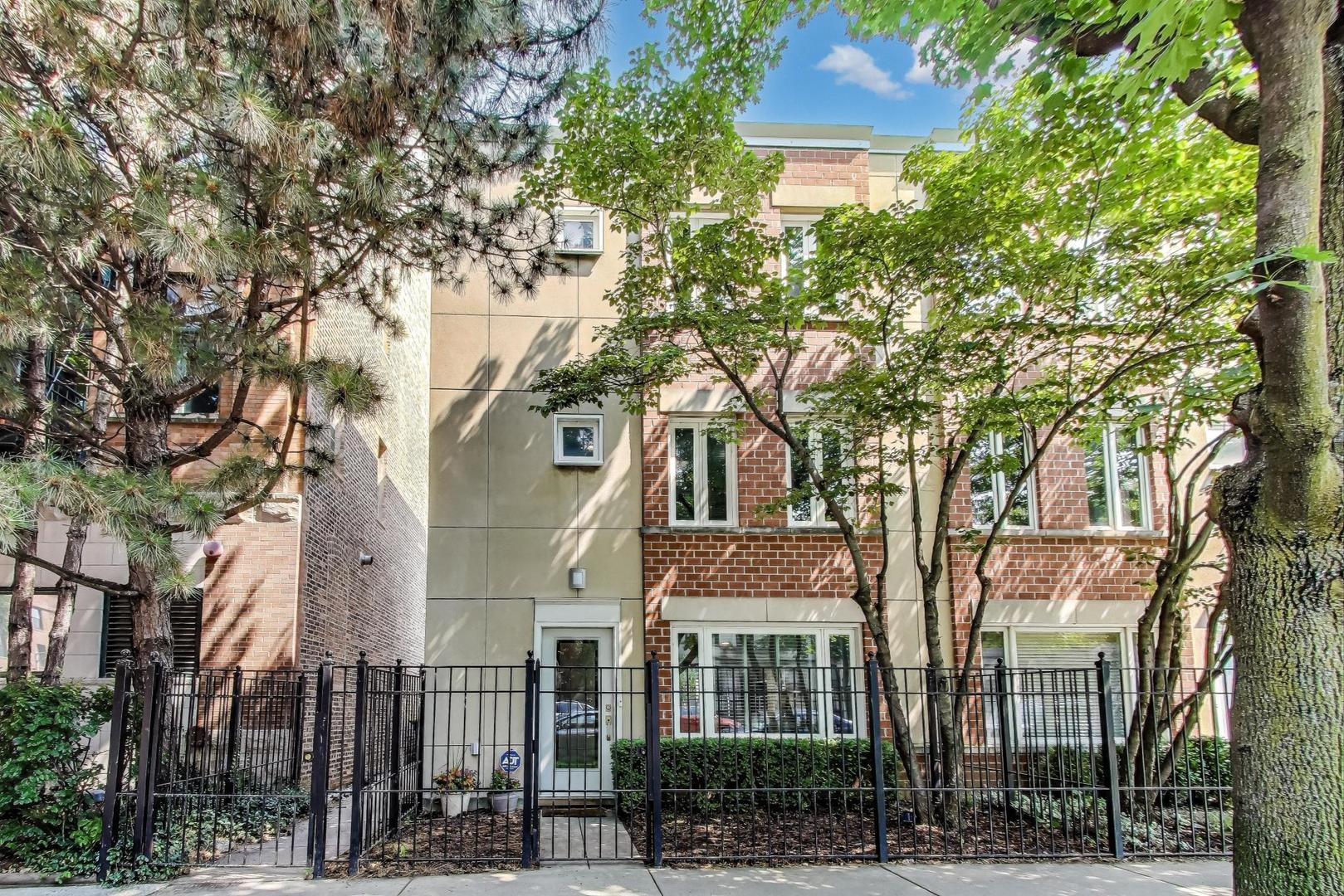Gorgeous end unit town house in prime Wrigleyville. This stunning home will impress at every turn with over $65,000 in recent upgrades. 3 bedroom + office/den and 2 bath town house sits at the end of a meticulously maintained courtyard with two private outdoor spaces.  Spacious living room/dining room and wood burning fireplace with slate surround. The kitchen features granite counter tops, custom cabinets with sliding drawers and a large pantry, and all new appliances (2024) The second floor features all new hardwood floors, and has a full bath with shower/tub and heated floors and two spacious bedrooms plus side by side laundry closet.  The top floor features a  flex office/work out/sitting space with French doors that leads to a quiet and  wonderful primary suite that features a large custom outfitted walk in closet, plenty of room for a king bed plus a stunning just finished primary bath with walk in shower, heated floors and quartz topped dual sink vanity(May 2025). Other upgrades include all new hardwood floors 2023, New HVAC 2024 for heat & 2025 for AC.  Private gated courtyard area with room for grill, patio set and landscaping. Gated entrance off Sheridan for easy street access.  Secure garage parking included.  Blocks to Lake Michigan beach, running/bike trails, Sheridan Red Line stop, Wrigley Field,  Lakeview/Wrigley retail and dining. This is an unbeatable value. move-in and enjoy.    First Showings are Saturday. Thank you for understanding.