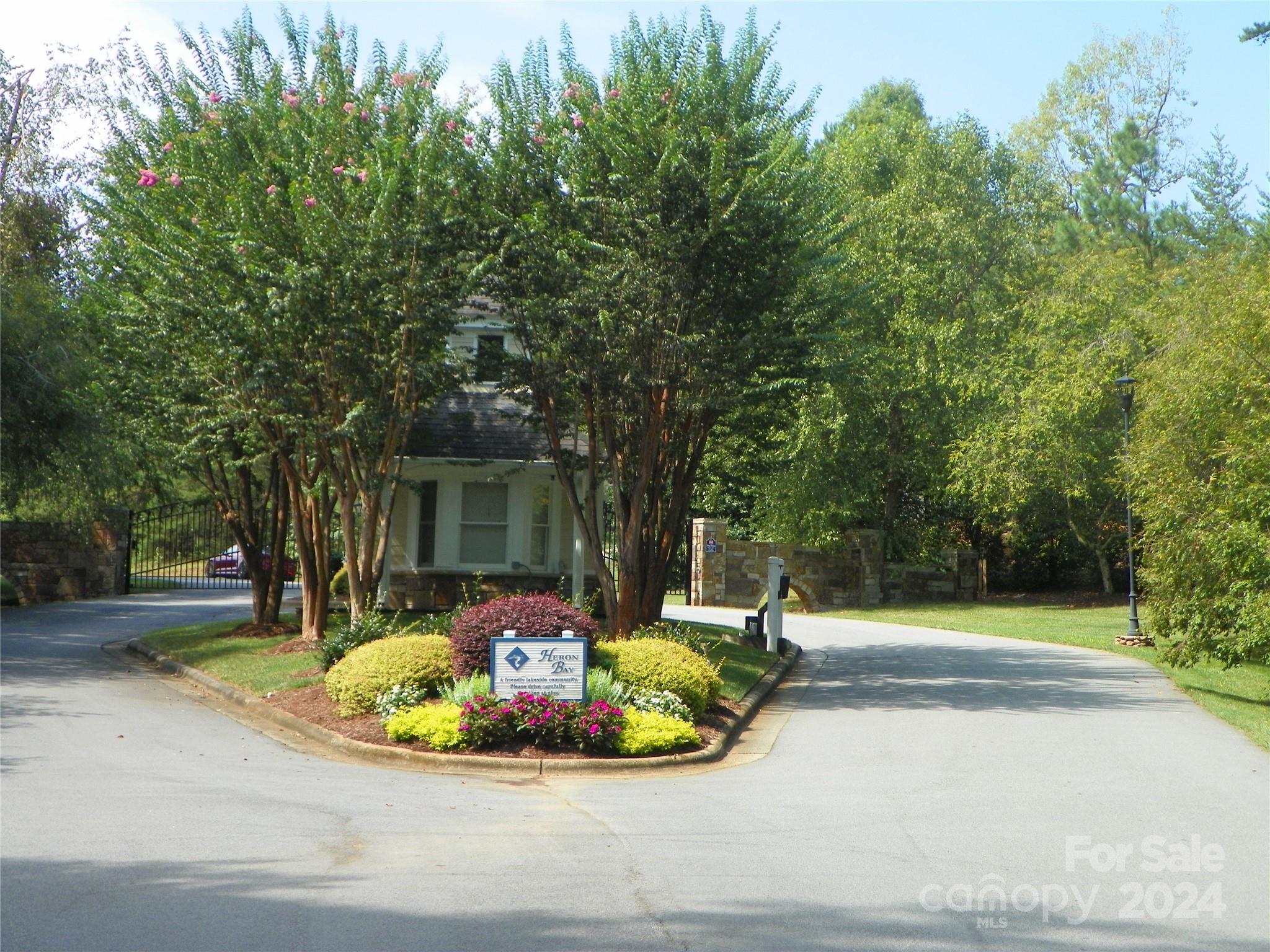 Property located in the gated community of Heron Bay, enjoy lantern lit streets a beautiful Clubhouse that may be reserved by property owners or personal functions.  Boat storage area for a small fee, enjoy the walking trails and a community boat launch beside the Clubhouse. The deeded boat slip D5 at Dock D conveys with this water front lot.
Play Pickle Ball across the street from the Clubhouse!!  Approx. 1 Hr. from major airports- Charlotte and Greensboro.  A very short distance from the Uwharrie National Forest for hiking, biking, ATV and much more!! Come and experience Lake Life for yourself!!!!