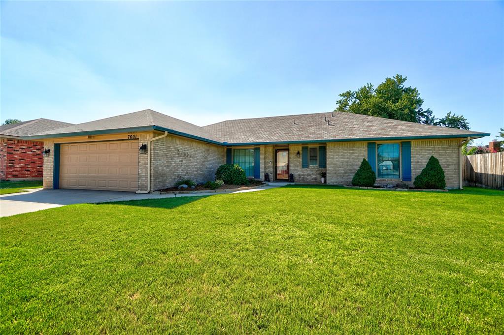 Welcome to 7601 Northway Ter in Oklahoma City! This well-maintained home offers a spacious layout with plenty of updates and character throughout. The large living area features beautiful flooring, recessed lighting, and a cozy fireplace, creating a comfortable space for relaxing or entertaining. The kitchen offers tons of cabinet and counter space, a large peninsula, tile backsplash, and plenty of room for dining. The spacious primary bedroom features a tray ceiling and a private bathroom with an updated vanity and an impressive tiled walk-in shower. Additional bedrooms provide plenty of space for guests, a home office, or everyday living. Outside, enjoy a fully fenced backyard with a large covered patio, perfect for relaxing or entertaining, along with a storage shed for extra convenience. The home also features an attached 2-car garage and easy-care flooring throughout much of the interior. With its spacious rooms, updated features, fireplace, and great outdoor space, this home has plenty to offer. Schedule your tour today!
