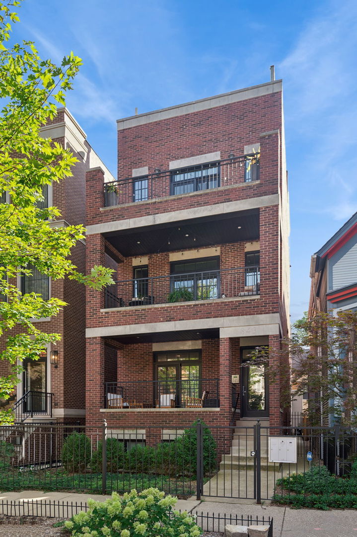 This fantastic 2 bed, 2 bath condo in an all brick building on a tree-lined street offers modern elegance, thoughtful design, and a location with unbeatable convenience. Featuring hardwood floors throughout, crown molding, and a bright, open-concept layout, this home is perfect for both everyday living and entertaining. The chef's kitchen boasts 42" cabinets, Viking stainless steel appliances, an elegant backsplash, and a large breakfast bar which flows seamlessly into the spacious living and dining area. The living area has a wood burning fireplace with a gas-starter, a space perfect for a desk or bar/serving area, and access to an oversized private balcony-ideal for relaxing or grilling! The spacious primary suite features a walk-in closet with custom organizers and a spa-like en-suite bath, including a steam shower, dual vanity, and heated floors. There is also a second bedroom and bath, and in-unit laundry. One garage space is included in the price as well as an additional common storage area. All of this in a prime Lincoln Park location-close to the train, parks, shops, restaurants, and everything this vibrant neighborhood has to offer. Don't miss your chance to call this exceptional condo home!