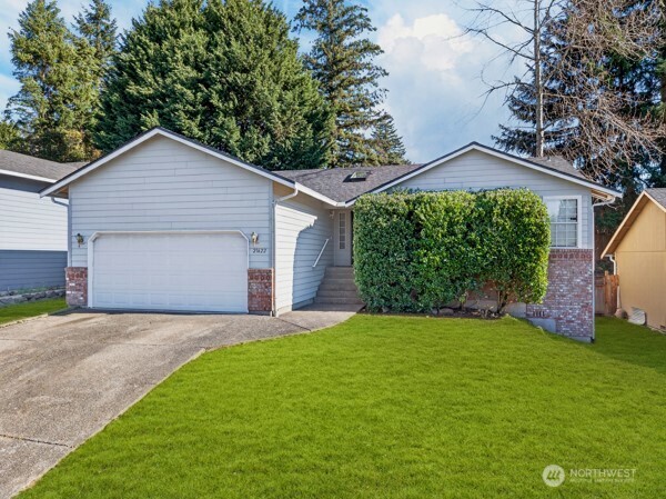 *Seller offering a $6,000 credit toward new carpet with accepted offer. Buyer may visit Great Floors to select carpet and pad within that budget, and installation will be completed prior to move-in once financing, appraisal, and inspection contingencies are waived and closing is scheduled.  Pride of ownership shines in this well-maintained rambler in Kent’s desirable East Hill community featuring a brand-new roof and new skylights for added value and peace of mind. Bright living area with large windows and a cozy brick gas fireplace. Spotless, functional kitchen and baths offer move-in-ready comfort with room to personalize. Three bedrooms, including a private primary suite. Fully fenced backyard with patio—perfect for relaxing or gardening. Convenient location near shopping, dining, parks, and highly rated school and major routes for an easy commute.    Use our preferred lender, Choice Home Mortgage, and receive a rate buydown and/or assistance with closing costs.