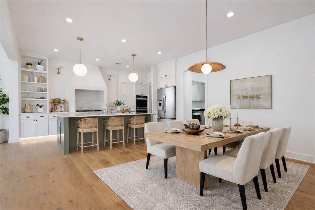 Inquire about builder-offered incentives that may be applied toward closing costs or design selections. Striking curb appeal begins with crisp white painted brick and sets the stage for this thoughtfully designed new construction by Iron Bison Homes, located in Ridge Creek, one of East Edmond’s premier gated communities featuring a neighborhood pool and serene ponds. Offering 2,806 square feet of well-planned interior living space plus 288 square feet of covered outdoor living, this home is designed for both everyday comfort and elevated entertaining. The patio’s masonry fireplace extends outdoor enjoyment through every season. Inside, Iron Bison’s signature craftsmanship is immediately evident. Pella windows and doors with custom casement trim, 10-foot ceilings, vaulted accents, and soft architectural arches create an airy yet refined atmosphere throughout. The open living and dining spaces flow seamlessly into the chef’s kitchen—beautifully appointed with custom maple cabinetry, full-extension drawers, a designer backsplash, and a walk-in butler’s pantry that blends form with function. The primary suite on the main level serves as a true retreat, featuring a spa-inspired bath with soaking tub, dual vanities, walk-in shower, and a pass-through laundry room conveniently connected to the primary closet. A flexible downstairs bonus room offers endless possibilities for a playroom, home office, or second living space. Upstairs, you’ll find three spacious bedrooms and two full bathrooms, each thoughtfully designed to maximize comfort, storage, and style. Every detail reflects Iron Bison’s commitment to quality, intention, and timeless design. Experience the craftsmanship that sets this home apart in one of East Edmond’s most desirable neighborhoods.