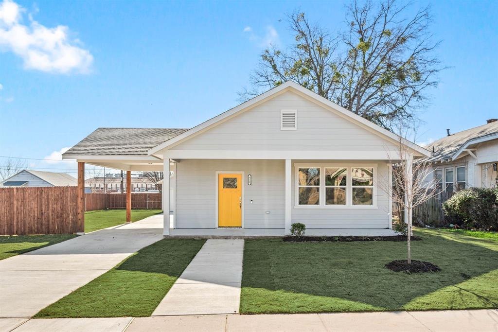 FIRST local home for sale in partnership with the Fort Worth Community Land Trust, a non-profit organization opening doors for Buyers who never thought home ownership possible. How it works: the Trust maintains ownership of the land, Buyers sign a ground lease to purchase the structures built on the land. Since the land value isn’t included in the price OR the mortgage financing, costs are considerably reduced for the purchaser! PLUS, SELLER PAYS TITLE-SURVEY and there’s up to $25K DOWN PAYMENT ASSISTANCE for qualified Buyers. This KEEPS THE LOAN EVEN LOWER, NEARER $210K! Some of the assistance can be used for rate buy-down or closing costs too. Criteria include NON-INVESTORS who have NOT OWNED A HOME IN 3 yrs, who meet the following INCOME LIMITS: Households with 2 people can earn max $68,300 - 3 no more than $76,850 - 4 is a max of $85,350 – 5 max $92,200. CONTACTING YOUR REAL ESTATE AGENT IS A MUST - they have access to income charts, program details and Lender info (must be approved by the Trust). Once vetted, your Agent can show this amenity-rich 1474-sqft ONE STORY less than 5-mi from Downtown Fort Worth in a Historic neighborhood. The property has a full-length covered front rain-porch, ENORMOUS yard, fiber cement siding, 6-ft wood fence, 3 beds, 2 full baths, 2 covered parking spaces. Which includes a 1-car oversized detached Garage with insulated panels & pedestrian door…and a 1-car Porte Cochere with direct access indoors. Inside, the Kitchen is wide OPEN to living-dining rooms with water line to fridge, microwave, vent mechanism, dishwasher, disposal, massive counter-height island eating, sizable hallway pantry. Primary is ensuite. There are 2 walk-in closets and both baths have Quartz countertops. Laundry is separate, full-size. PERKS! Foam insulation, ring doorbell, LED lighting, low-E double-pane windows, woodsy luxury vinyl plank, window blinds, heat pump, electric water heater, curbs, sidewalks, extra driveway parking. Builder’s Warranty included.