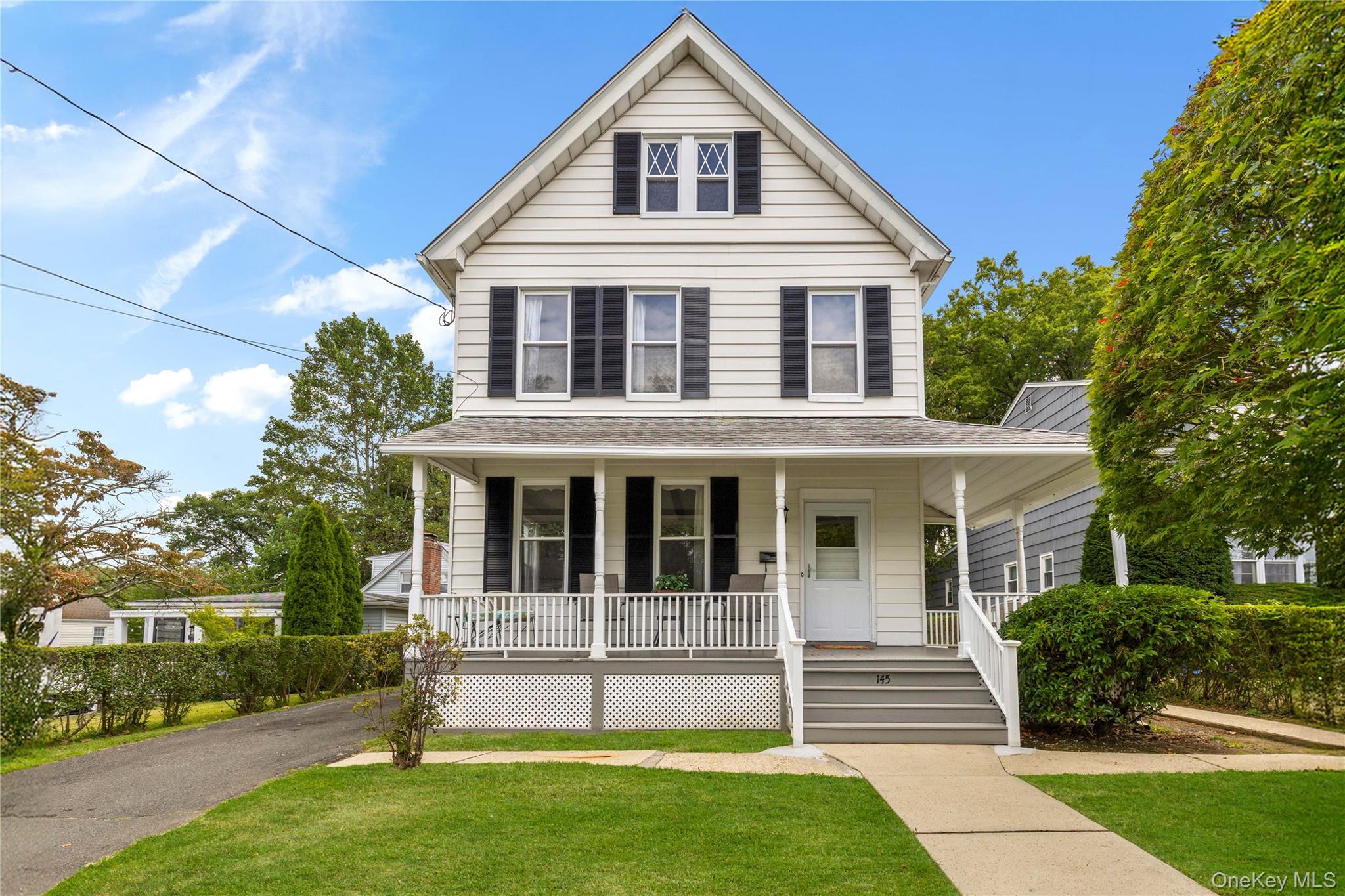 First Time Offered in Over 50 Years ! Welcome to 145 Harrison Avenue.
Unlock the potential of this classic three-bedroom Colonial, ideally located just a short walk from town and the railroad. Lovingly held for generations, the home is full of character and ready for its next chapter. Hardwood floors throughout, eat-in kitchen, and the convenience of a first floor laundry enhance the home's original charm and livability. From the iconic wrap-around front porch to the deep backyard where family gatherings and kickball games once filled the air with laughter, this property tells a story of simpler times. A wonderful patio and expansive yard offer even more space to enjoy. With solid bones, low taxes, and a location that’s hard to beat, it’s an ideal opportunity for investors, builders, or anyone ready to restore and reimagine. Bring your creativity and vision—it’s more than a house—it’s a story waiting to continue. Property is strictly being sold "as is."