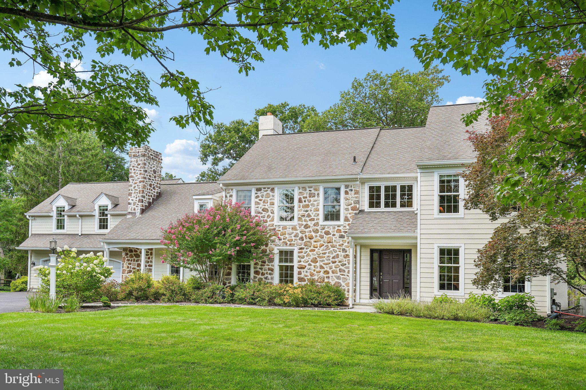 Welcome to your forever home at 409 Chester Rd. Nestled on a 2 acre cul-de-sac lot in the heart of Devon, this property is more than just a house—it is a sanctuary where your most cherished memories are waiting to be made. From the moment you arrive, the stylish stone and Hardi Plank exterior captivates you, radiating a timeless, welcoming charm. A convenient and elegant side entrance out front hints at the thoughtful design that awaits inside. Step through the front entrance and feel an immediate sense of warmth and belonging. Exquisite crown mouldings gracefully frame the spacious rooms, while a new dual-zone AC ensures your comfort no matter the season. Picture your family gathering in the living spaces on a crisp autumn evening, warmed by the glow of three different fireplaces inside, offering the perfect, cozy mix of both wood and gas.The heart of this home is undeniably the breathtaking gourmet kitchen. Whether you are a culinary master or just love hosting, you will fall in love with the upgraded soft-close cabinets, gleaming stainless steel appliances, and the professional-grade 6-burner gas stove. A large island with seating invites loved ones to gather around and share stories while dinner simmers. Just steps away, enjoy your morning coffee in the sunlit breakfast room, or unwind with a good book in the adjacent, cozy keeping room.When it is time to rest, the home offers five generous bedrooms, providing a peaceful retreat for everyone. The luxurious primary bath serves as your personal, spa-like haven to wash away the stress of the day. A versatile bonus flex room offers endless possibilities—be it a playroom, a home theater, or a quiet studio. With 3 full and 2 half baths perfectly placed throughout, the home effortlessly accommodates the bustling rhythm of daily life.But the true magic of 409 Chester Rd awaits in the backyard. This home lends itself to both indoor and outdoor entertainment! Summer days will be spent laughing and splashing in the stunning in-ground, saltwater pool. A magnificent covered patio awaits where you can view your favorite sports game while grilling on your XO built-in grill and having s'mores by the fireplace.  As the sun sets, let the sounds of nature wash over you—a serene stream babbles gently just behind the yard, backing to a tranquil line of mature trees in this park-like setting that offers ultimate privacy and peace while you're surrounded by beautiful landscaping and nature.This isn't just a place to live; it's a place to breathe, to celebrate, and to truly feel at home.