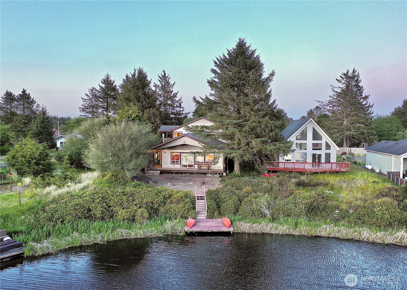 Ultimate Waterfront Escape for Outdoor Enthusiasts on the Bell Canal! A dream come true for sportsmen, anglers, and  anyone who loves to entertain—This stunning 2,460 sq ft home features vaulted ceilings, cozy fireplaces, and a chef-inspired  kitchen perfect for entertaining. The main level includes a spacious primary suite, and two bedrooms while the upstairs  offers a fully equipped apartment with its own kitchen, living area, and bedroom—ideal for guests or long-term rental  income. Outdoors, enjoy RV parking, a basketball hoop, a 3-car garage with a game room/shop, a gorgeous sunken firepit  leading to your own private dock. The home is fully furnished and move-in ready. Plus, an additional waterfront lot (Lot  436) is available for $75K w/ Full Price Offer.