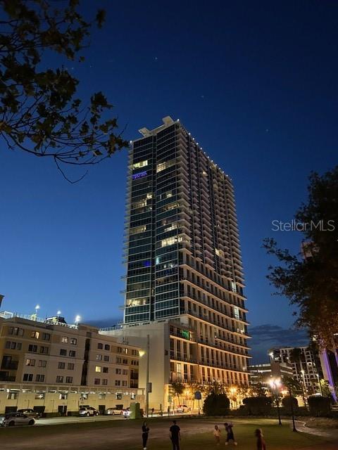 Welcome to The Vue—where elevated high-rise living meets modern comfort in the heart of Downtown Orlando. This beautiful 32nd floor two-bedroom, two-bathroom condominium offers an open-concept layout designed to capture stunning skyline views and unforgettable sunsets through expansive floor-to-ceiling windows in the main living areas and owner’s suite . The kitchen features wood cabinets, granite counters, a breakfast island and a full suite of new stainless steel GE Profile appliances, including a 29 cu. ft. refrigerator, gas range with dual ovens, dishwasher, and a microwave with convection and air-fry capabilities—ideal for entertaining. The primary bedroom's ensuite is sure to please with dual walk-in closets, garden tub and separate shower. The laundry area includes new GE Cafe front-load washer and ventless condenser dryer. There’s even a newly installed REME HALO HVAC air filtration system. Which, for allergy sufferers, ensures a cleaner, healthier indoor environment. Step out onto your balcony to enjoy views that stretch across the city to the Disney fireworks and stadium events.The VUE has unmatched amenities including a state-of-the-art fitness center, rooftop pool and terrace, 24-hour security/concierge, basketball/tennis court, dog walk, outdoor grilling areas, and a resident lounge overlooking Lake Eola Park, with a private movie theater and billiards. There’s even a secured wine vault. Extra parking spaces are available to rent.