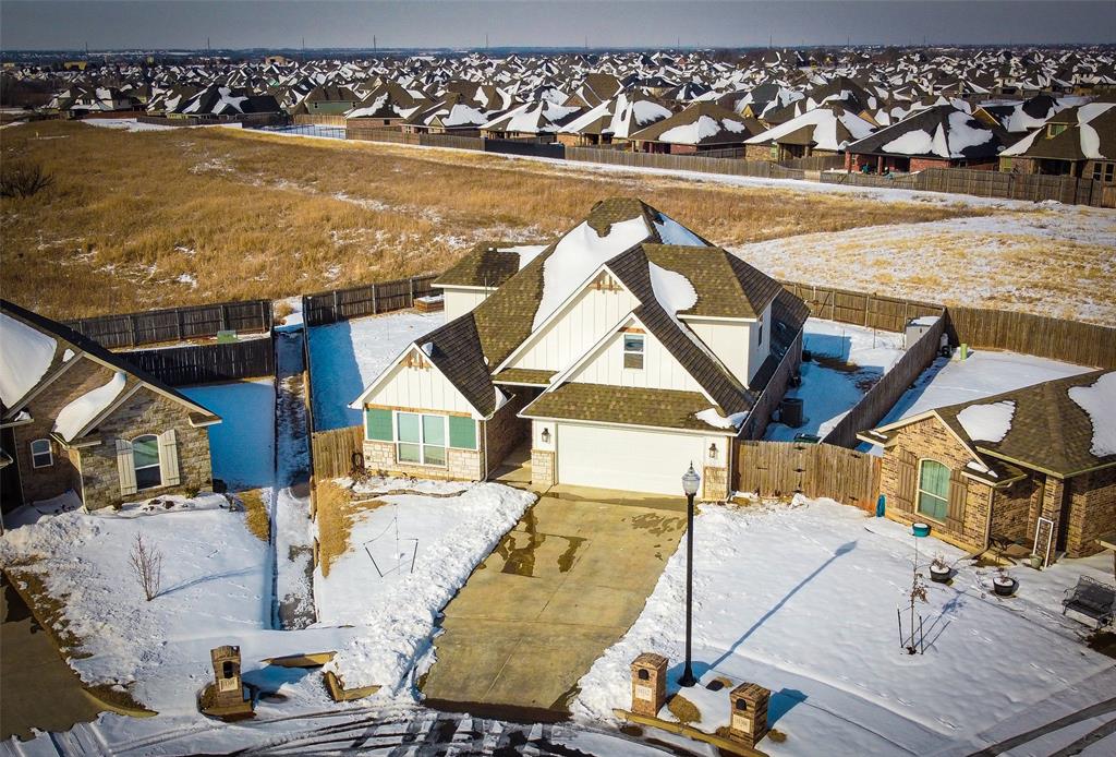 Beautifully maintained 4-bedroom, 3-bath home with a charming Craftsman-style exterior, located in a quiet cul-de-sac in the sought-after Grove Addition. Built less than 5 years ago, this home offers modern design, energy efficiency, and quality construction by Home Creations. Inside, you’ll find tall ceilings, elegant finishes, and ample storage throughout. The open-concept kitchen is ideal for entertaining, featuring a spacious pantry, large island, and cozy living area with fireplace. A versatile upstairs bonus room provides space for a second living area, game room, guest suite, or theater. Set on a lot larger than a quarter-acre and backing to a greenbelt, this home offers both space and privacy. The Grove neighborhood features resort-style amenities including a pool, parks, playgrounds, walking trails, and a clubhouse. Conveniently located near top-rated schools, shopping, dining, and major amenities.