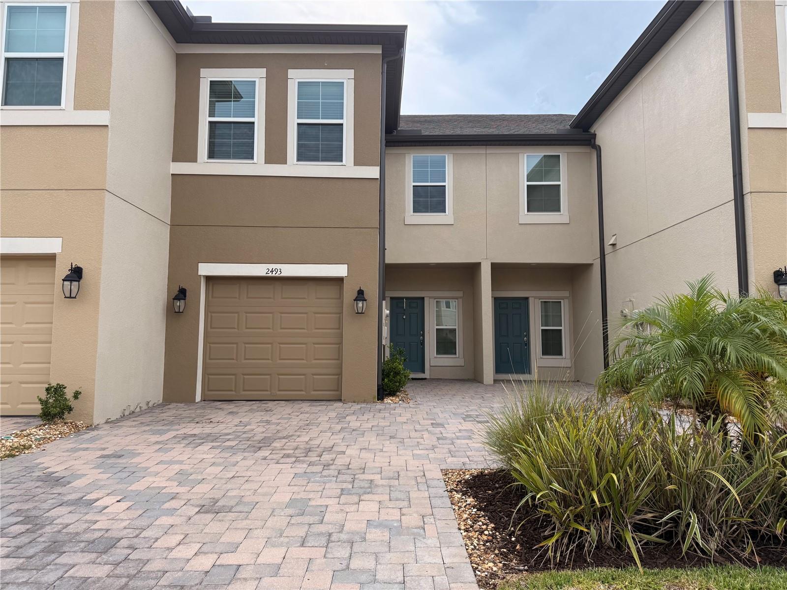 One or more photo(s) has been virtually staged. One or more photo(s) has been virtually staged. 
Welcome to this beautifully maintained 3-bedroom, 2.5-bath townhome with an one garage, nestled in a quiet, gated community in Wesley Chapel. The open-concept layout features a modern kitchen with ample cabinetry, perfect for cooking and entertaining. Step outside to your private screened patio and enjoy peaceful waterview. The first level includes a convenient half bath, while upstairs you'll find a spacious primary suite with a walk-in closet and private bathroom, along with two generously sized guest bedrooms and a full guest bathroom. Ideally located near Wiregrass Mall, Tampa Premium Outlets, I-75, and top-rated schools. Lawn care, water, trash, and clubhouse amenities are all included for a truly maintenance-free lifestyle.