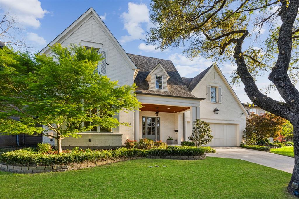 Perfectly situated on a quiet, hidden street and perched high on an elevated lot in the coveted Lakewood neighborhood, this timeless and charming 2016 custom-built home blends quality and craftsmanship with today’s modern comfort in one of Dallas’ most beloved neighborhoods. Thoughtfully designed and beautifully finished, the home offers five bedrooms, including a downstairs guest suite with an en-suite bath, as well as a powder bath, mudroom, wet bar, large utility room, attached two-car garage, and four inviting living areas that accommodate both everyday living and gracious entertaining.The home’s interiors are appointed with rich hardwood flooring, beamed ceilings, upgraded lighting and plumbing fixtures, custom draperies, and a gas fireplace that anchors the main living area.  The open kitchen is a true cook’s centerpiece with Thermador stainless steel appliances, stone countertops, and abundant storage that reflects the home’s exceptional level of finish.  Built-in sound speakers enhance the entertaining experience throughout. Upstairs, the primary suite offers a spacious retreat with a luxury bath that includes a soaking tub, separate shower, double sinks, and a generous walk-in closet. Additional bedrooms and an upstairs game room provide flexibility for family, guests, work, or play. The resort-style backyard is an oasis designed for year-round enjoyment, showcasing a sparkling pool with fountains, an expansive covered patio with a fireplace and motorized screens for effortless indoor-outdoor living. A covered dining pavilion with an outdoor kitchen assures easy entertaining that is sure to impress. Perfectly situated, this special property is zoned to Lakewood Elem and just minutes from White Rock Lake and Lakewood Village. A rare offering in a premier neighborhood, this home has it all – luxury, comfort, and an unbeatable location!