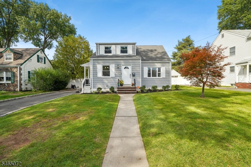 Fully renovated 4 bd, 2 full bath Cape on a quiet, tree-lined street near Mohawk Park, approximately 2 min to the GSP. Every space has been redone, with hardwood floors, a brand-new kitchen & updated baths, so the work is done & nothing is left on the to-do list. This layout offers 2 bds on the main level & 2 bds upstairs, so a main-level bd can serve as a home office, guest room or den while the upper beds stay private. Partially finished basement adds flexible space for a rec room, home gym or media room, plus valuable storage. Outside, an 8 ft vinyl privacy fence encloses the backyard, creating a private setting & a 3-car driveway provides ample off-street parking. The neighborhood sits between the GSP & the Clark border, set back from downtown traffic. Commuters enjoy quick access to the GSP, Rt 22, the NJ Turnpike & Newark Liberty Int'l Airport. The downtown train station on NJ Transit's Raritan Valley Line offers connections at Newark Penn & select off-peak direct trains to NY Penn, plus NJ Transit bus service to Port Authority in Manhattan. Downtown also offers the historic theater, restaurants, cafes & shops. Served by Walnut Ave & Livingston Ave Schools (elementary) & Hillside Ave School (middle). With highway access minutes away & rail service to Newark & NYC in town, this turnkey home makes the daily commute easy. Schedule your private showing & see every update for yourself.