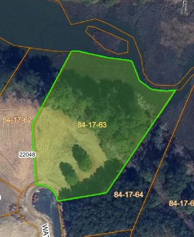 Build your Eastern Shore retreat on this beautiful 1.7-acre homesite located in the desirable Tower Hill subdivision, just minutes from the beaches, shops, and dining of Cape Charles. With a blend of mature trees and open space, this property offers the perfect balance of privacy and possibility. Convenient access to Cape Charles, Kiptopeke State Park, marinas, golf, and local amenities. Community setting with a spacious, rural feel