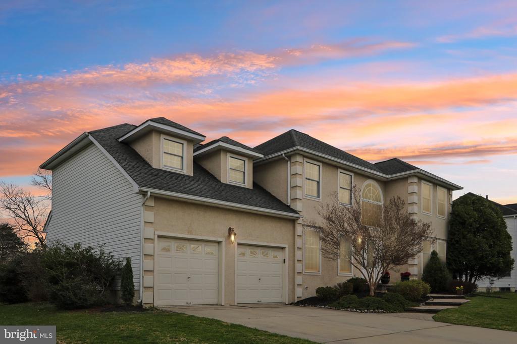 Welcome to 14 Hilltop Drive — where timeless colonial charm blends beautifully with modern updates in the highly desired Autumnwood community. The moment you pull up, you’ll feel it: this stunning home offers irresistible curb appeal with its picture-perfect façade and welcoming presence. Step inside and be greeted by bright, airy spaces filled with natural light, sleek luxury vinyl plank flooring, and a smooth, open-concept flow that makes everyday living and entertaining feel effortless. The thoughtfully designed layout shines with a formal Dining Room perfect for memorable gatherings, while French doors from the Living Room open into a warm, inviting Family Room centered around a cozy fireplace — the ideal spot to relax and connect with family and friends. Just steps away is the heart of the home: a stunning, fully updated Kitchen that’s sure to impress. It features rich wood soft-close cabinetry, elegant granite countertops, stainless steel appliances, a striking tile backsplash, a generous center island, and a convenient butler’s pantry. A refreshed Powder Room and Laundry Area complete the main level with style and convenience. Upstairs, escape to your private Primary Suite, complete with a large walk-in closet and a spa-like Bathroom featuring a frameless glass shower and a luxurious Jacuzzi tub — your personal sanctuary after a long day. Three additional spacious Bedrooms (one notably oversized) and a beautifully updated Full Bathroom with dual vanity provide comfort and flexibility for family or guests. The unfinished Basement with high ceilings is a blank canvas ready for your vision — whether you dream of a home gym, theater room, play area, or extra living space. Outside, discover your own private backyard retreat. Mature trees create a peaceful, secluded setting, while the large paver patio just off the Kitchen is perfect for al fresco dining, weekend barbecues, or simply unwinding under the evening sky. Conveniently located near top-rated schools, shopping, dining, and easy commuter routes, this home delivers the lifestyle you’ve been looking for. 14 Hilltop Drive is more than just a house — it’s the home you’ve been dreaming about. Don’t wait — homes like this move fast in Autumnwood. Schedule your private showing today and imagine making it yours.