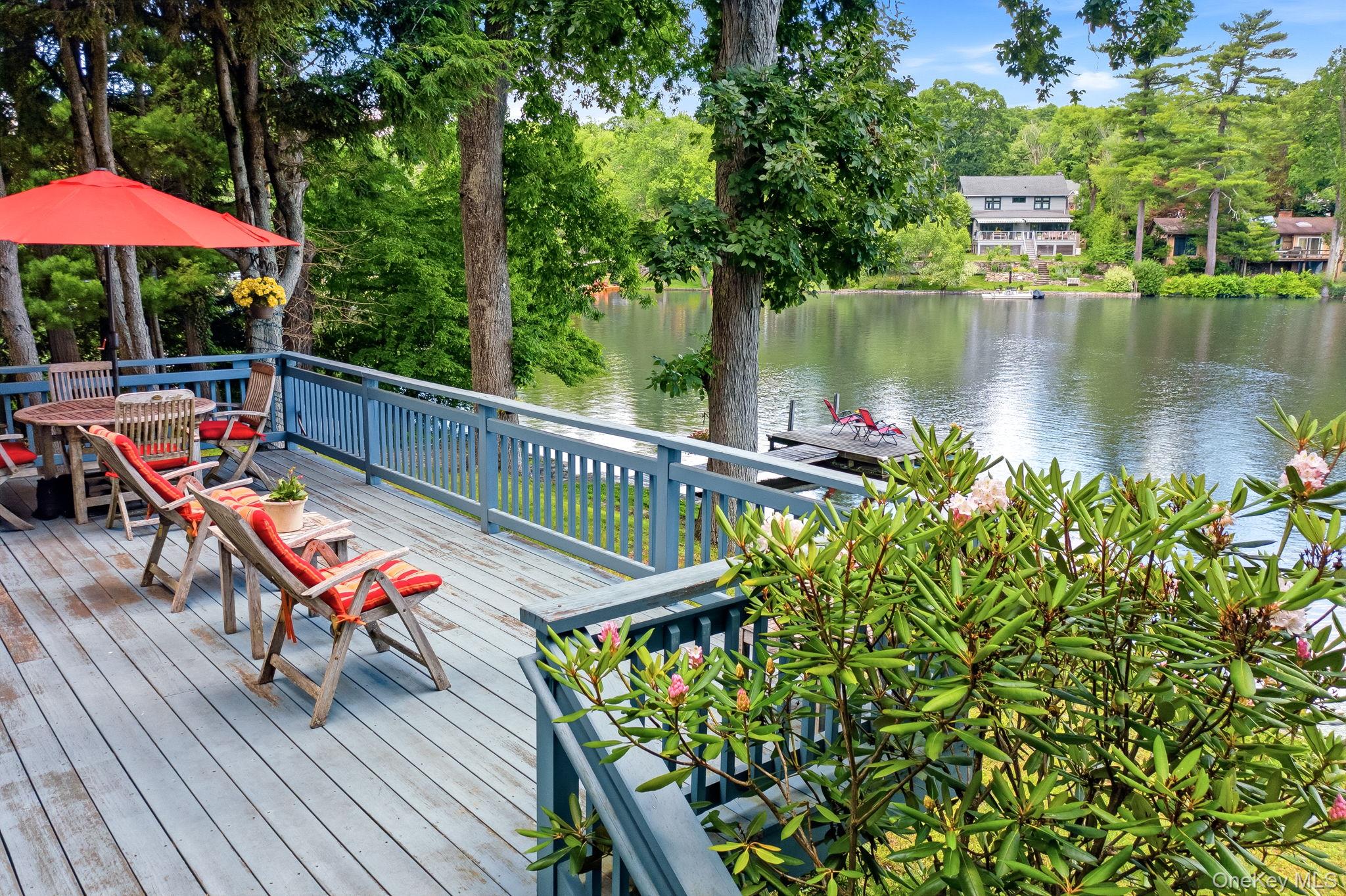 A special opportunity to own a piece of Westchester's sought after private lake communities!  Beautifully sited on 83 acre Lake Truesdale.  It has a large deck and dock overlooking the water, along with a private driveway.  This 1930 antique colonial  is full of character - beamed ceilings, a fireplace and glass doors opening to a deck built for lakeside living.  The spacious living room with fireplace/dining room combo offers a wonderful layout to reimagine.  Bring your vision and updates to transform this classic retreat into your dream home.  Residents enjoy swimming, fishing, boating (electric motors only), sailing, paddle boarding and kayaking in warmer months, and ice skating and ice fishing in winter.  All this and a private beach!  Convenient to schools, shopping and town park.  Ideal for full time living or a weekend getaway, this is a canvas ready for it's next chapter.