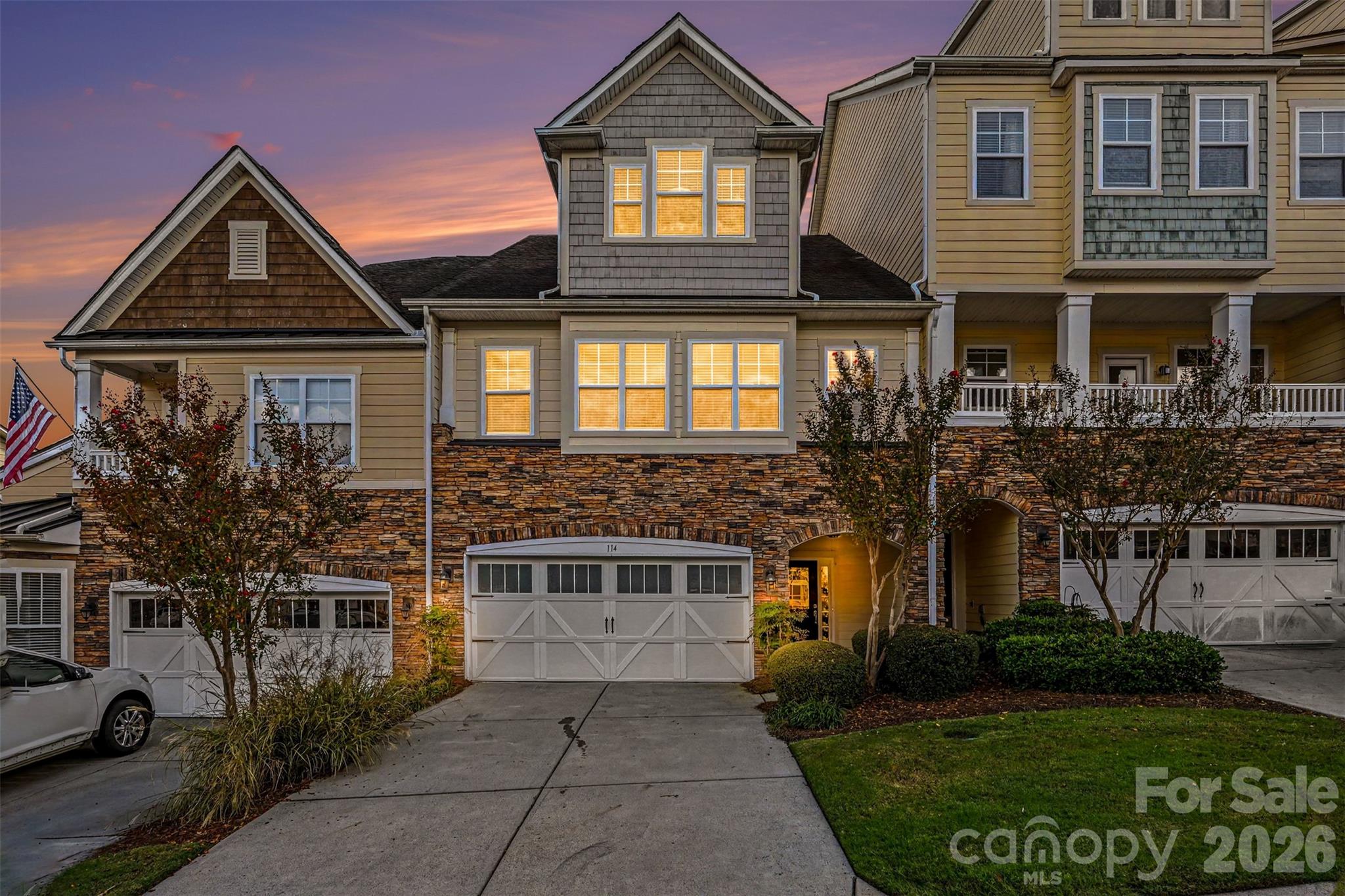 Welcome to this beautiful Tega Cay home where spacious living, thoughtful features, and a fantastic location come together! The open main level is perfect for everyday living and entertaining, featuring a spacious kitchen with abundant cabinetry, island seating, pantry, and a striking floor-to-ceiling stone fireplace surrounded by built-ins. Upstairs, the primary suite feels like a true retreat with its own private balcony, large walk-in closet, and spacious bath with dual vanities, soaking tub, and separate shower. Two additional bedrooms and a generously sized laundry room complete the second floor. Head upstairs again to a large third-floor bonus room with a walk-in closet and its own balcony, giving you even more space to relax, entertain, work, or play. An oversized garage adds valuable storage and functionality, while a whole-house water filtration system and hot water heater, both approximately 3 years old, add to the home's appeal. Enjoy being just steps from the Tega Cay pool, playground, sand volleyball court, and Lake Wylie, with plenty of opportunities to enjoy the outdoors right in your community.