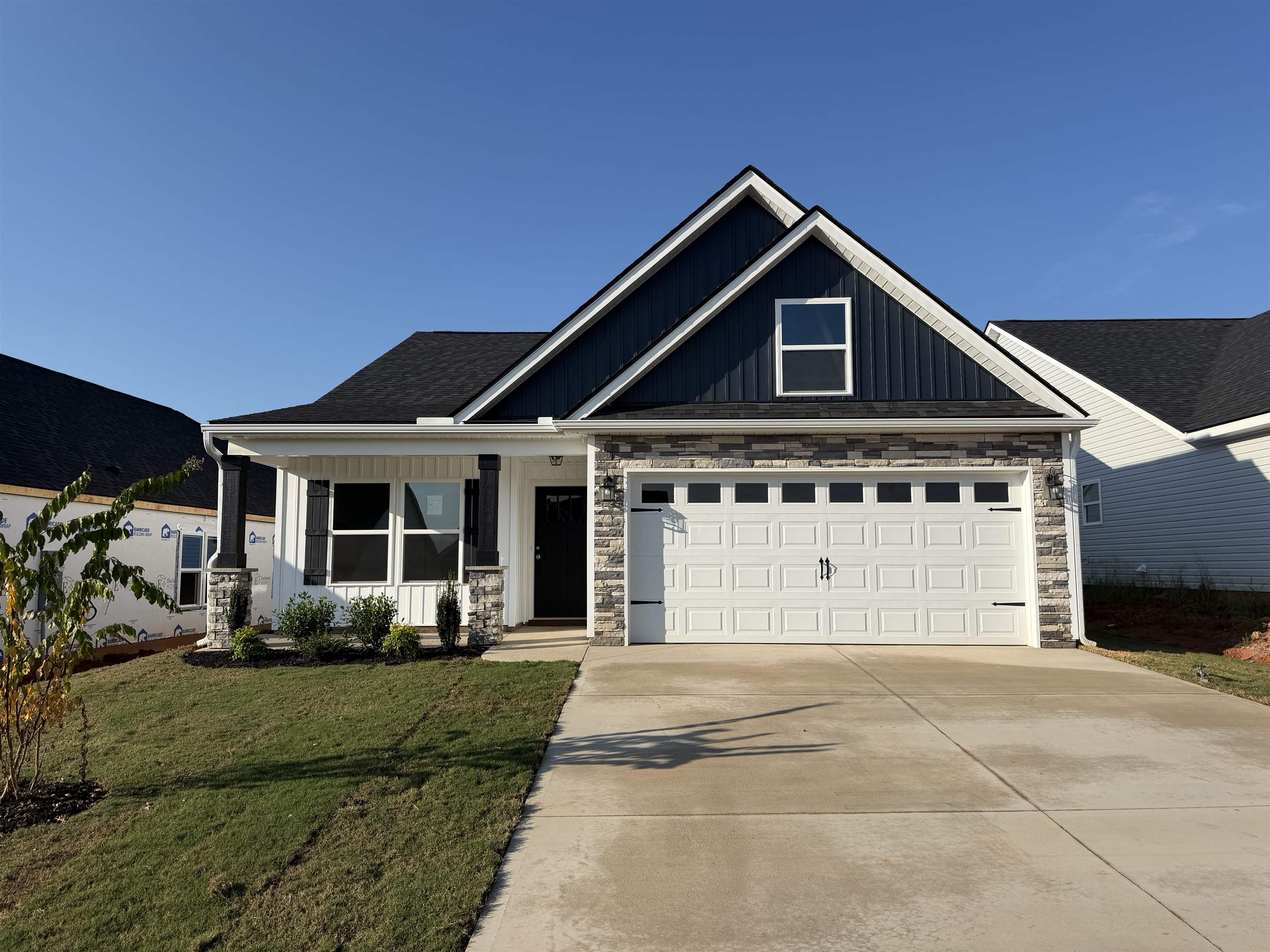 The BISHOP plan (Lot 87) offers an open-concept layout with a spacious main living area and dedicated study—designed for both everyday living and flexibility. Interior features include granite countertops, crown molding with rope lighting, and numerous included upgrades throughout.  The owner’s suite features an upgraded bath with dual vanities and walk-in shower.  Enjoy outdoor living from the 12' x 12' covered patio. Quality construction features include site-built construction, 30-year architectural shingles, and a 10-year limited warranty for added peace of mind.  Closing cost assistance and/or upgrade incentives may be available when using a preferred lender and closing attorney.  Virtual tour reflects the same floor plan and may include options, upgrades, or finishes not included in the actual home.