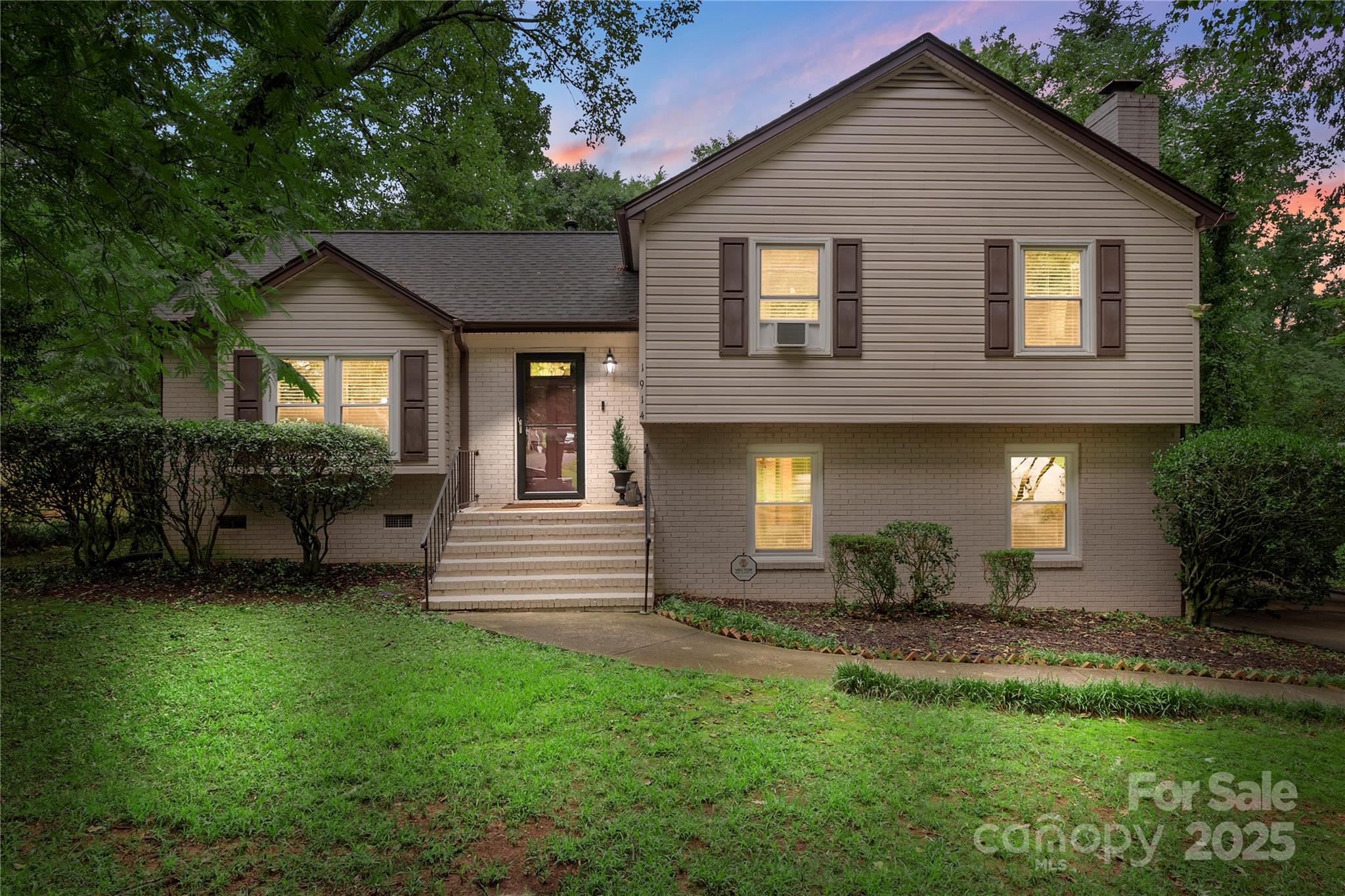 Welcome to this fantastic split-level home with no HOA! This 4 bedroom/3 bathrooms home offers a bright, open floor plan, neutral paint and hardwood flooring on the main and upper level! The living room flows seamlessly into the well-appointed kitchen including abundant cabinetry, granite countertops, stainless steel appliances, custom tile backsplash, and an eat-in area. The primary suite is complete with bathroom and dual closets. The secondary bedrooms on the upper level are generously sized and offer a great flex space if an extra office or hobby space is needed. The lower level features a spacious recreation room with a cozy fireplace provides the perfect spot for gatherings or movie nights. A 4th bedroom and full bathroom is also located on the lower level providing so many ways to utilize this home! The expansive rear deck overlooks the nearly 3/4 acre lot with large backyard and storage shed—ideal for gardening, play, or entertaining.