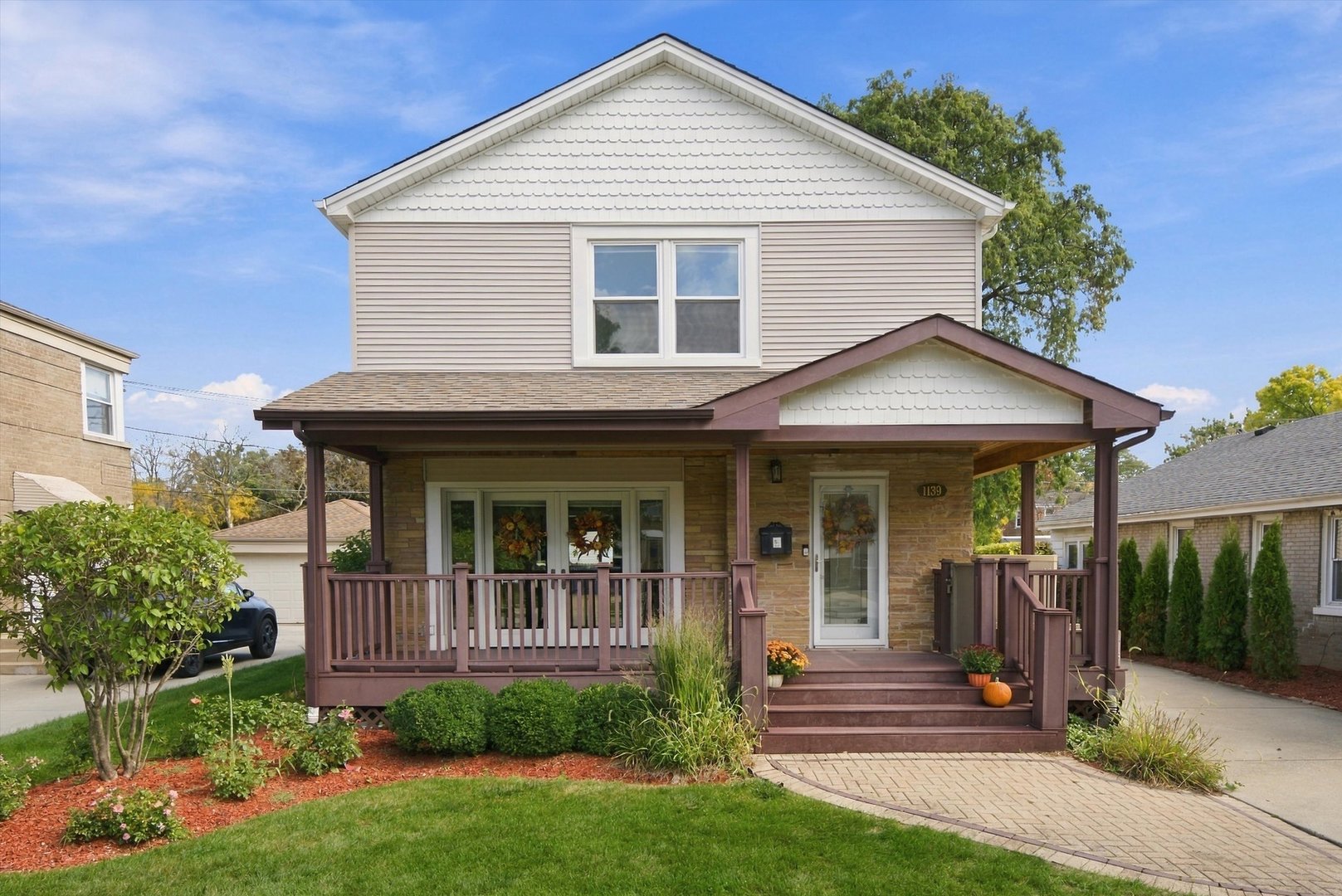 Welcome to this absolute stunner in desirable La Grange Park! With inviting spaces inside and out, this 4-bedroom, 3 1/2-bath home is made for comfortable living and year-round entertainment. Natural light fills the home, highlighting beautiful hardwood floors and an updated kitchen featuring stainless steel appliances and striking granite countertops. Floor-to-ceiling windows create a beautiful connection to the outdoors, while the cozy front porch offers a welcoming spot to relax and unwind. Out back, enjoy the expansive composite deck overlooking the beautifully manicured lawn-an ideal setting for summer gatherings, entertaining friends, or simply enjoying a quiet evening outside. The front yard features an invisible fence, adding convenience for pet owners. Inside, the finished lower level offers even more room to spread out, with a great space for movie nights, abundant additional storage, and an updated bathroom with separate shower area that adds convenience and privacy for guests. An oversized two-car garage provides plenty of room for storage, while the concrete driveway offers ample additional parking for overnight guests. With generous living space, thoughtful features, and wonderful indoor-outdoor entertaining options, this La Grange Park gem is ready to welcome you home!