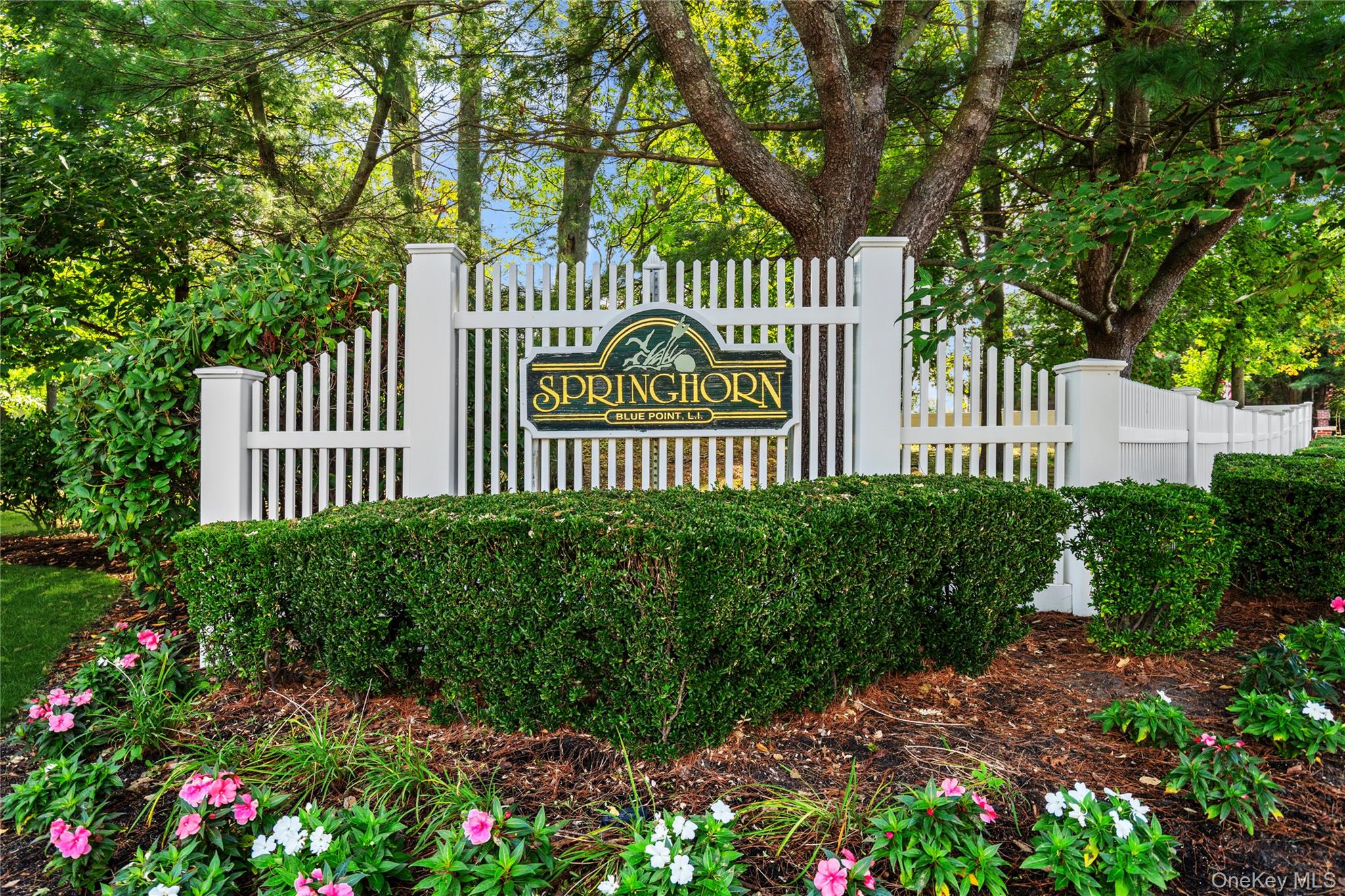 Fabulous, one-story, Springhorn Condo in a wonderful location within this coveted 55+ community. As soon as you drive into this intimate community, with it's charming, tree-lined streets, you will feel like you are home! The Condo has a welcoming, front porch and is sunny and cheerful with a wonderful, open floorplan. The eat-in kitchen has white cabinets and a peninsula where you can also sit. The kitchen opens into the dining room and living room. The Primary bedroom is very spacious and has it's own full bath. Relax in the living room with cathedral ceiling and skylight, as well as sliding doors to take you out to your patio to enjoy views of the greenspace and trees. There is 1200 square feet of living space and an attached garage with a ramp. Full size washer and dryer with storage space. Springhorn is perfectly located with close proximity to the grocery store, waterfront restaurants, parks, shopping and the Great South Bay. The community shares a lovely clubhouse and in-ground pool.