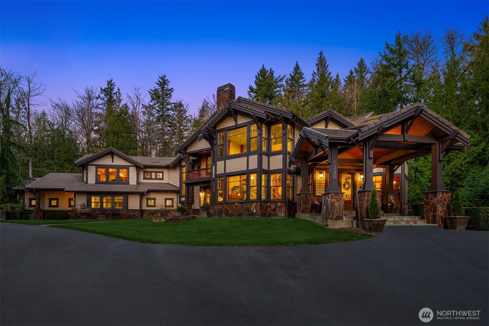 Tucked away in the gated Estates at Blakely Woods, this magnificent timber-frame architectural wonder feels like your own private 6,000sf mountain lodge resort! Situated on 3.96 secluded acres with manicured grounds, cascading waterfall pond & lush forest views at every turn. Elegant & sophisticated yet warm & inviting with a refined touch of rustic flair. Built to last with solid high-quality materials, the wood craftsmanship is truly extraordinary. Dramatic open truss ceilings, gorgeous wood-framed windows, custom built-ins & thick, oversized millwork throughout. Impressive stone columned porch & marble foyer open to stunning wrought-iron staircase & soaring living room with 2-story slate fireplace. High-end chef's kitchen with massive island + butler's pantry with wet bar & 120-bottle wine cooler. Grand family room with towering wall-of-windows, stone fireplace & built-in media center opens to 2nd-story loft & french doors to fully-equipped theater. Primary suite with cathedral ceilings, romantic fireplace, lavish marble bath, indulging steam shower & private laundry. 2 ensuite bedrooms with adjoining Jack & Jill lofts + secondary suite with covered balcony. Exquisite wood paneled library with travertine fireplace. 2nd staircase opens to huge bonus room with pool table & wet bar. An outdoor oasis with sprawling blue stone patio & showcase open beam covered lounge with masonry fireplace, DCS grill, fridge & granite counters. Private irrigation well & 4-car dream garage!