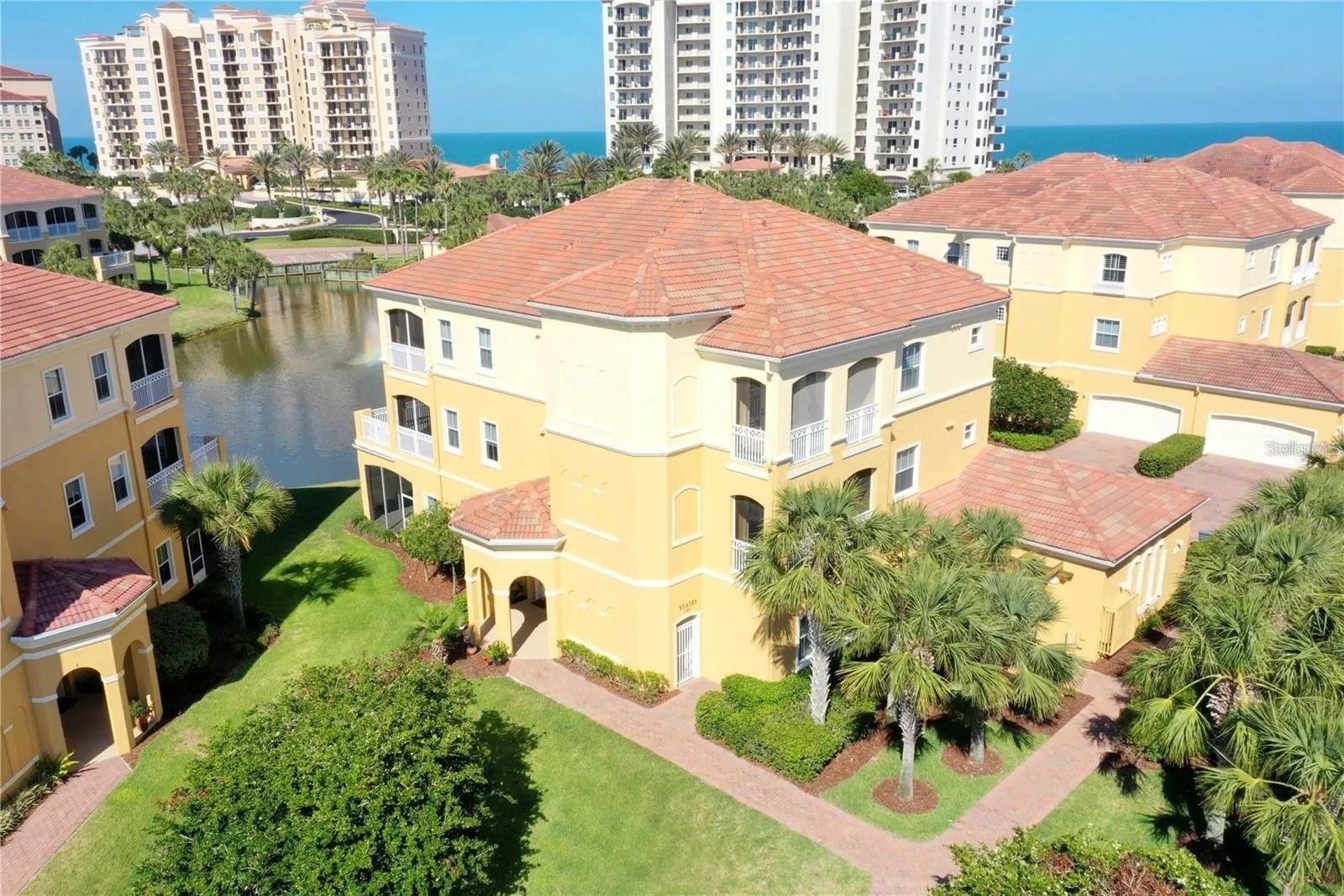 Live in paradise all year round with maintenance free living the beautiful oceanfront community of Hammock Dunes in Casa Bella II. This 3 bedroom, 2.5 bath condo feels like home living with its own private garage, screened patio, scenic views, community pool and fitness center out your back door and just a walk to the beach. Casa Bella is just 3 units in each building and a 2 car garage with additional storage which gives owners a sense of single family home ownership. This immaculate condo has had over $40,000 in upgrades including new HVAC, Total kitchen remodel, water heater replaced in 2021, Luxury Vinyl flooring in all bedrooms, new appliances and all new light fixtures. The oversized primary bedroom extends into a luxurious ensuite bath with his and her vanities, dual walk in closets, garden tub and large walk in shower. Hammock Dunes also offers membership to two world class Audubon certified championship golf courses, two clubhouses with dining, tennis, pickle ball, croquet and bocce ball. This unit is priced to sell and offers the utmost in unparralled luxury for the distinguished buyer.