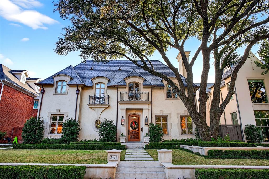 Experience elevated living in this immaculate Highland Park home, blending luxury and livability just steps from Armstrong Elementary. Designed to feel both sophisticated and relaxed, the home offers an open floor plan ideal for effortless entertaining. With 5 bedrooms, 6.2 baths, and five fireplaces, the interiors are richly appointed. The chef’s kitchen features Wolf appliances, a built-in SubZero refrigerator, and a Miele coffee machine, while a unique wine cellar connects both the formal dining room and kitchen.The gorgeous, spacious primary suite provides a serene retreat. Beyond the main living areas, you’ll find leathered bar ceilings, French doors opening to artificial turf, and beautiful landscaping, creating an inviting indoor–outdoor flow. The home sits on a generous 65 x 150 lot, offering exceptional space and privacy.A detached back house includes a golf simulator and movie theater, not counted in the home’s square footage, and can be converted back to a three-car garage if desired. Additional features include a built-in grill, camera system, and integrated audio throughout.A remarkable opportunity to enjoy refined comfort and premier walkability in the heart of Highland Park.