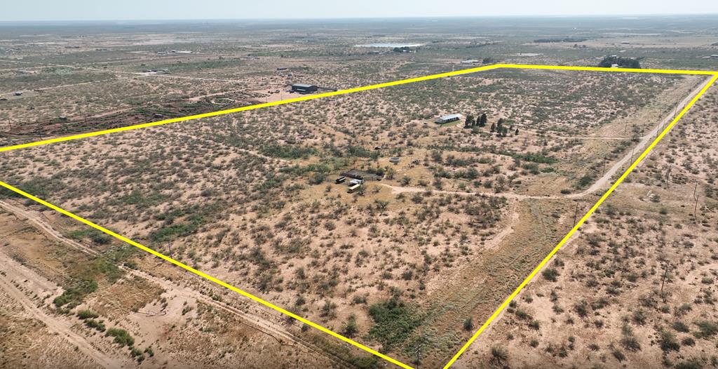 Discover 78.75 acres under wide-open West Texas skies in the Greenwood school district! Once the historic McClintic Ranch HQ, this unrestricted property is perfect for ranching, development, or a private retreat. The 1,710 sqft home features a metal roof, water well, propane tank, Starlink internet, and Generac generator, with stunning Midland skyline views from the front porch. Fully fenced and ready for livestock, the ranch includes a stock tank, feeder, pens, and room to roam. Claim your piece of West Texas.