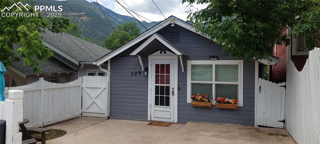Your search is over!  VACATION RETREAT, INVESTMENT OPPORTUNITY, OR HOME SWEET HOME! This 2-bedroom, 2 bathroom is a cozy, serene escape with convenience and historical charm in the heart of Manitou Springs. Just a short walk to numerous, quaint shops, unique cafes, a famous historic luxury hotel/restaurant,  a hiker's dream of an abundance of hiking trails to include the Manitou Incline, Williams Canyon, and many more! This home features a private deck for the tranquil enjoyment of the mountains that surround the town, wildlife, and fresh air. This home has new paint, new tile, and many updates in the main level bathroom, new quartz countertop in the kitchen, luxury vinyl plank flooring, newer carpet, composite decking, a rare off-street parking space, and a private rear access that could be great for a roommate or teenager. This property was used as a vacation rental and comes with all the furniture, linens, decor, dishes, and cookware with the right offer. Extra storage available from the rear of the home.