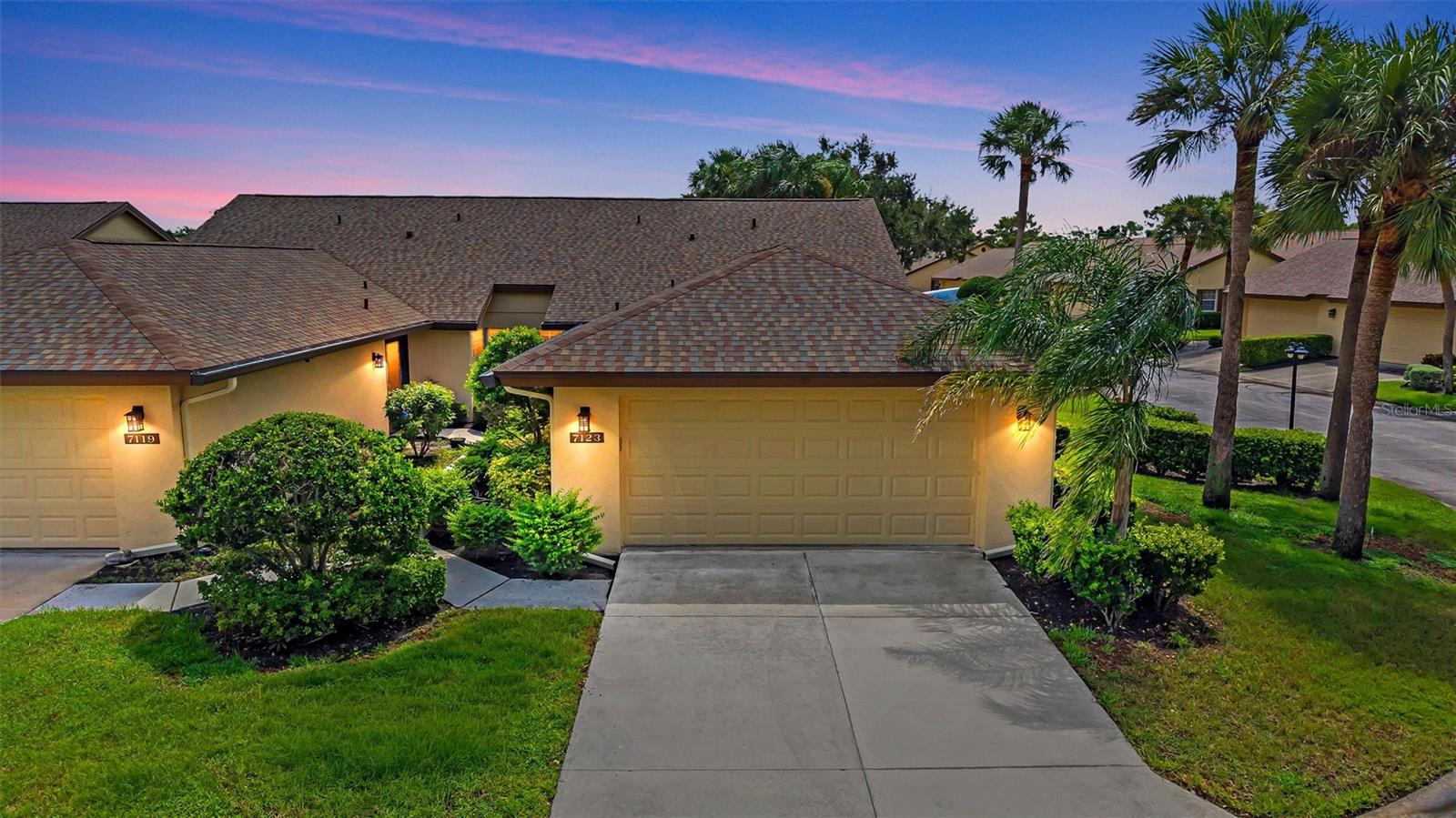Under contract-accepting backup offers. MAINTENANCE FREE LIVING! NEW ROOF! NEW HVAC! This beautiful villa is located in the WoodLake Villas section at Palm Aire, a sought-after Sarasota community. Featuring 3 bedrooms, 2 bathrooms, 2-car garage, and a screened in lanai! Inside the home, is an open floorplan with split bedrooms for extra privacy. The third bedroom has the option to be fully enclosed or to have open, it can be used for an open office, formal dining room, or as flex space to utilize as desired. TILE FLOORING THROUGHOUT! NO CARPET! The kitchen has been remodeled and includes GRANITE COUNTERTOPS, STAINLESS-STEEL APPLIANCES, UPDATED CABINETS WITH SOFT CLOSE DOORS/ DRAWERS, BREAKFAST BAR, AND BREAKFAST NOOK! Next to the kitchen are sliding doors leading to a side porch, perfect for added outdoor seating! The home has VAULTED CEILINGS for a spacious open feel. The Owner's suite has TWO WALK-IN CLOSETS, with an Ensuite bathroom that includes a DOUBLE SINK VANITY, MOSAIC TILE ACCENT, GARDEN TUB, AND SEPARATE WALK-IN SHOWER! GRANITE COUNTERTOPS IN BOTH BATHROOMS! Enjoy Florida living with close proximity to Siesta Key Beach and Anna Maria Island, as well as shopping centers, restaurants, and grocery stores while still being tucked away in a peaceful neighborhood. Come and see everything this home has to offer, call today to schedule a private viewing!