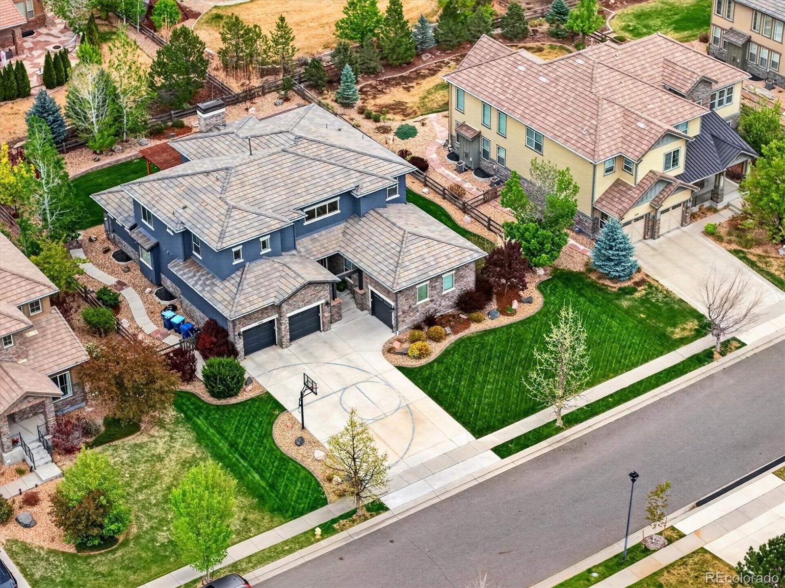 **Where Family Has Room to Flourish** Nestled within the highly sought-after community, this exceptional 5-bedroom, 4-bath home offers a rare combination of space, functionality, and flexibility designed for the way families live today.From the moment you enter, soaring ceilings, abundant natural light, and a dramatic two-story great room create a sense of openness while maintaining a warm, welcoming feel. At the heart of the home, the beautifully appointed kitchen features granite countertops, stainless steel appliances, rich cabinetry, an oversized pantry, and a generous center island that seamlessly connects to the dining and gathering spaces, perfect for everything from busy weekday mornings to holiday celebrations.One of the home's most coveted features is the main-floor primary suite, offering privacy, convenience, and flexibility for multi-generational living or those seeking the ease of main-level living. The thoughtfully designed floor plan continues upstairs, where 4 spacious bedrooms are arranged in a desirable wing-style layout. Connected by an open gallery overlooking the great room below, the upper level provides the perfect balance of togetherness and personal space, complete with both a Jack-and-Jill bath and an additional full bath.Large unfinished basement with rough-in plumbing and future potential.Outside, enjoy Colorado living at its finest with a beautifully maintained backyard, extended patio, and pergola—ideal for entertaining, relaxing, and creating lasting memories.A two-car garage plus a separate third-car garage provides exceptional storage and versatility rarely found at this price point.Ideally located near parks, trails, open space, and top community amenities, this is more than a home, it's a place where families can grow, gather, and thrive for years to come. Rarely does a home offer this combination of size, comfort, flexibility, and future potential in one of the area's most desirable communities.