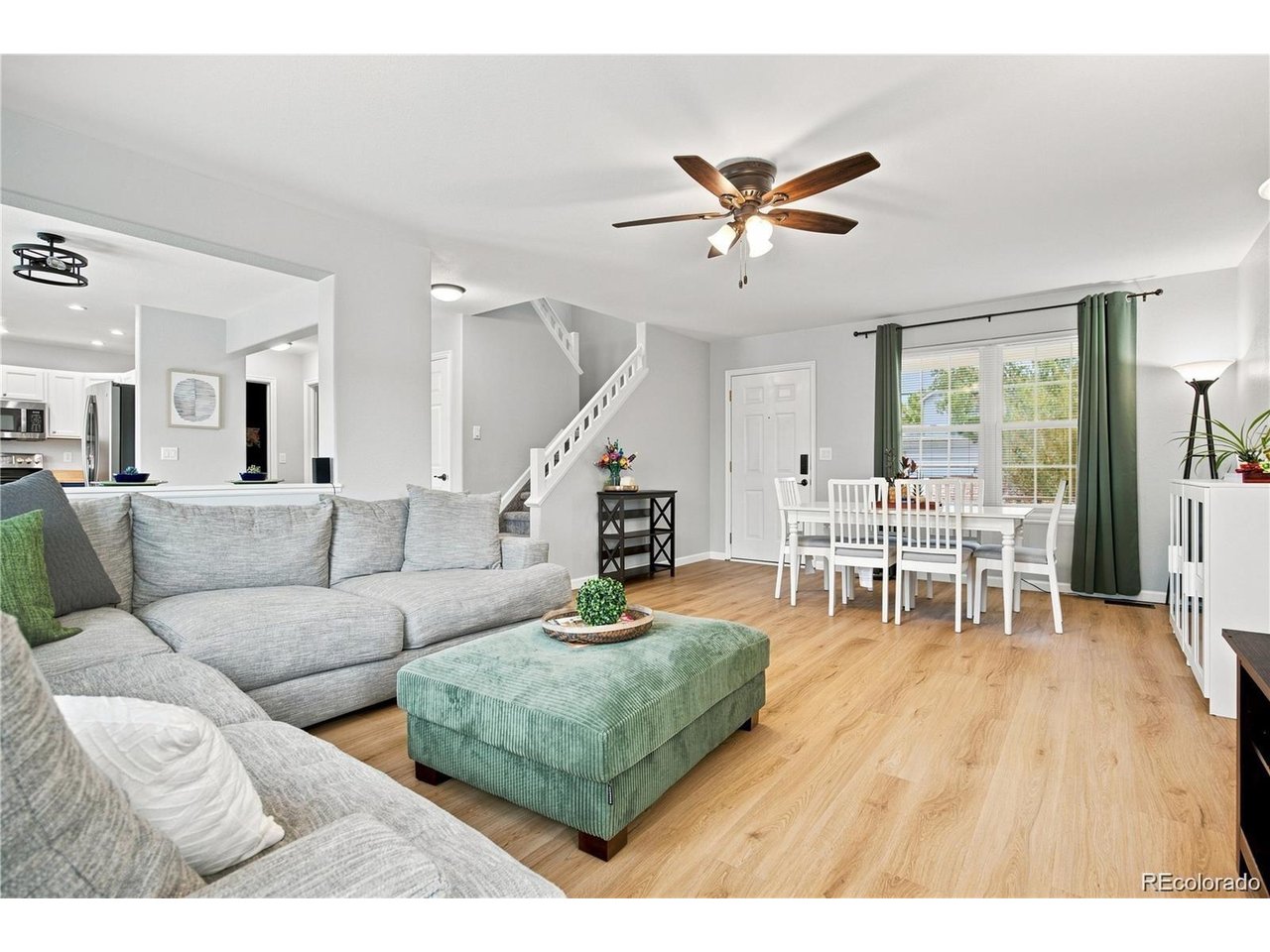 Welcome to this beautifully updated home in the highly sought-after Fox Run community, where bright, comfortable living meets a neighborhood that makes it easy to feel connected. From the moment your inside abundant natural light, soft neutral paint & beautiful LVP flooring throughout create a space that feels fresh, warm & move-in ready. The easy-to-maintain flooring means less worrying about everyday messes & more time enjoying your home. The open-concept main level was made for gathering whether cooking dinner while hosting game night or bringing everyone together for the holidays. The updated kitchen features stainless steel appliances, warm butcher block countertops & generous cabinet space, combining character, function & plenty of room to cook & entertain. A convenient half bath completes the main level. Upstairs, the large primary suite feels like a private retreat, complete with an upgraded 3/4 bath, updated vanity & abundant storage. Two additional generously sized bedrooms & a full bath offer room for family, guests or a home office. The unfinished basement provides a rare opportunity to create a space entirely your own. Envision a home gym, additional bedroom, office, playroom, theater or second living area designed around the way you live.Step outside to the large backyard & newer concrete patio, perfect for summer BBQs, birthday parties & evenings with friends. There is room to spread out, entertain & enjoy Colorado's beautiful seasons. Living here is about more than the house. Festivals & community events are held within walking distance at nearby Susan Carpenter Park, where summer evenings can mean walking to an event, gathering with neighbors or watching fireworks close to home. An attached 2-car garage adds everyday convenience, especially when winter arrives. With parks, shopping, dining & commuter access nearby, this Fox Run home feels easy to live in, fun to gather in & connected to the community around it.