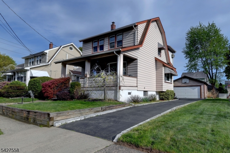 Charming Dutch Colonial in prime Fair Lawn location. A welcoming front porch leads you to a generously sized Living Room. Custom wood columns and built in cabinetry separate the Living Room from the Dining Room that is well lit by a beautiful bay window providing plenty of natural light. The woodwork and details throughout the home is stunning! Owner says there are beautiful hardwood floors under the well worn carpeting. The Eat-In-Kitchen has plenty of cabinets and counter space with a pantry just off the kitchen.  There is an enclosed back porch with access to the back yard., As well as a side door entry with access to the full partially finished basement with laundry and an additional toilet. Upstairs you will find an updated (2016) full bath, an oversized primary bedroom with a spacious walk-in closet and two additional bedrooms. This delightful 3-bedroom, perfectly blends classic charm with modern convenience. Nestled on a quiet, tree-lined street, yet just minutes from top-rated schools, parks, shopping and perfect for NYC commuting including a nearby Train Station.