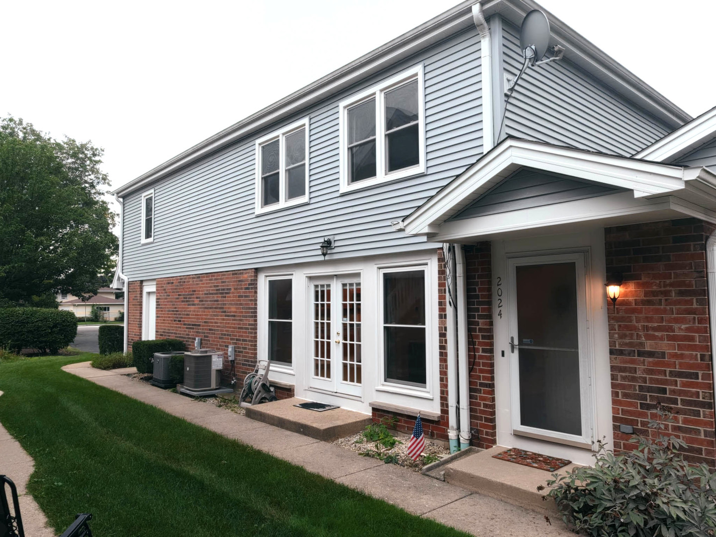 Open 9/6/26, 12pm-1:30pm.  Move right in to your updated new home that feels like a single family house with your own yard!  Just step outside and enjoy the huge park-like open space adjacent & directly behind the property.  Children & Fido will love it, too!  And there's more, it's also adjacent to Falcon Park & Recreation Center and 1 block to Osage Park & playground!  Inside be amazed by the cherry hardwood flooring throughout, remodeled kitchen with ample cabinet space, granite counters, stainless steel appliances & travertine flooring.  Tons of natural light with a wall of windows in the living room & kitchen along with recessed lighting on 1st floor.  Both bathrooms have been remodeled, too! The entire interior has been recently painted in attractive neutral colors.  Your sanctuary in the finished basement offers additional living space with a recreation room or work-at-home area or even an extra bedroom.  The 1 car attached garage leads directly into the townhome for convenience.  The wains-coating and crown molding add that timeless and traditional touch of elegance & Colonialist feeling.  The location is 2nd to none being so close to shopping, the Buffalo Creek Forest Preserve with bicycle & walking paths and Route 53.  Newer mechanicals, newer carpeting in basement!  Monthly assessments are reasonable for this self-managed HOA!  Pet friendly, too!  Come fall in love with your new home!
