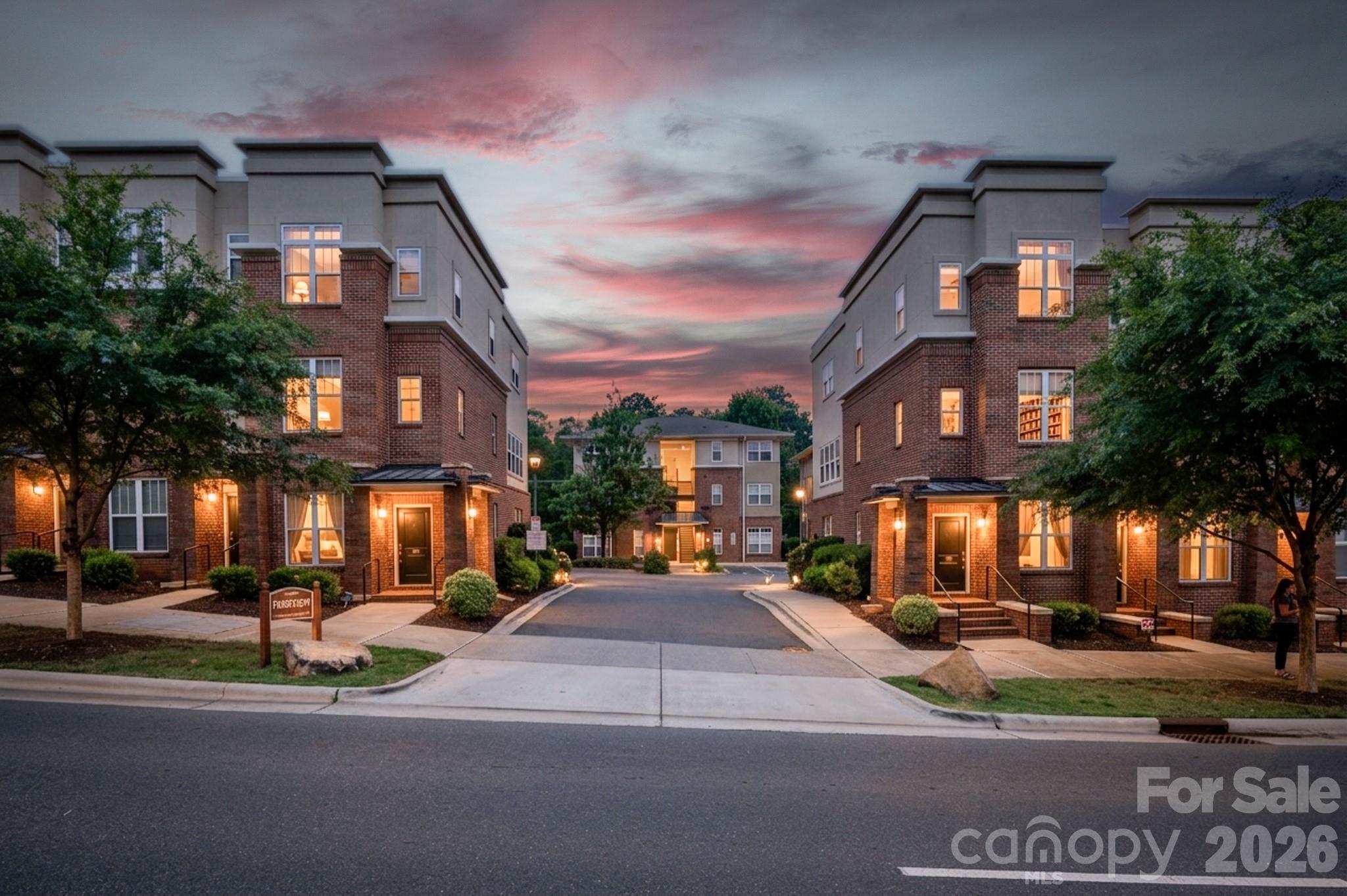 Modern condo living meets peaceful privacy at 1308 Kenilworth Ave #430, ideally situated in Dilworth with easy access to South End and Uptown Charlotte.This 2-bedroom, 2-bath residence features an open-concept layout with oversized windows and a seamless flow between the kitchen, dining, and living spaces.The kitchen is equipped with stainless steel appliances, generous cabinetry, ample prep space, and a modern tile backsplash, all opening directly into the main living area for easy everyday living and entertaining. Large sliding glass doors lead to a covered balcony overlooking Latta Park, creating a rare sense of privacy and tranquility.The split-bedroom floor plan offers flexibility and separation between sleeping areas, with a spacious primary suite featuring an ensuite bath and large windows with peaceful natural views. The secondary bedroom and full bath provide additional versatility for guests, office space, or other household needs.Additional highlights include assigned parking, low-maintenance condo living, and HOA dues of $250 per month. Built in 2005, the community offers convenient access to dining, shopping, entertainment, parks, grocery stores, fitness studios, and everyday amenities throughout Dilworth, South End, and Uptown.This condo offers an exceptional opportunity to enjoy connected city living with a private residential feel!