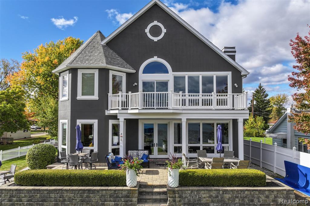 Stunning 4,750(+/-) sq ft custom lakefront home on Lobdell Lake featuring 5 bedrooms, 4 full baths, and 2 half baths. Completely remodeled with a gourmet kitchen and new whitewashed ash, Brazilian cherry, and Brazilian chestnut hardwood floors. Enjoy gorgeous water views from nearly every window, a private fenced yard, and an outstanding 800 sq ft mother-in-law suite with new flooring, a full bathroom, private bedroom, and its own separate entrance. The home also includes an oversized 4-car garage, stamped concrete driveway, and plenty of room for entertaining inside and out.