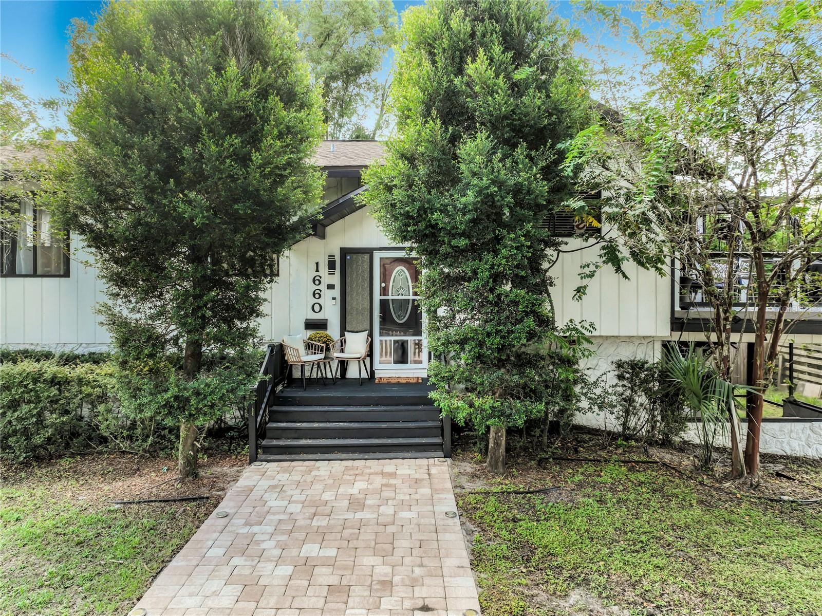Don’t miss this wonderful opportunity to own a 3-bedroom, 2-bath home in the desirable Orwin Manor area of Winter Park, conveniently located just minutes from AdventHealth, Park Avenue, Downtown Orlando, and I-4.This spacious two-story home features a flexible layout with a two-car garage, remodeled bathrooms, and plenty of living space. The first floor offers a large bedroom, a beautifully remodeled full bathroom, a laundry area and access to the enclosed/screened patio and backyard.Upstairs, you’ll find an open kitchen with stainless steel appliances, a dining area, and a spacious living room. The second floor also features two bedrooms, including the primary bedroom with a remodeled bathroom. Wood flooring and carpet are featured throughout the home.Additional improvements include a roof approximately 5 years old, completely refreshed landscaping and outside power washed. Sliding doors off the kitchen and dining area lead to a new outdoor deck, creating an ideal space for outdoor dining, entertaining, and enjoying the Florida lifestyle.The convenient location provides easy access to major roads, shopping, dining, entertainment, and all that Winter Park and Downtown Orlando have to offer. This home offers a great combination of location, space, and recent updates. Schedule your showing today!