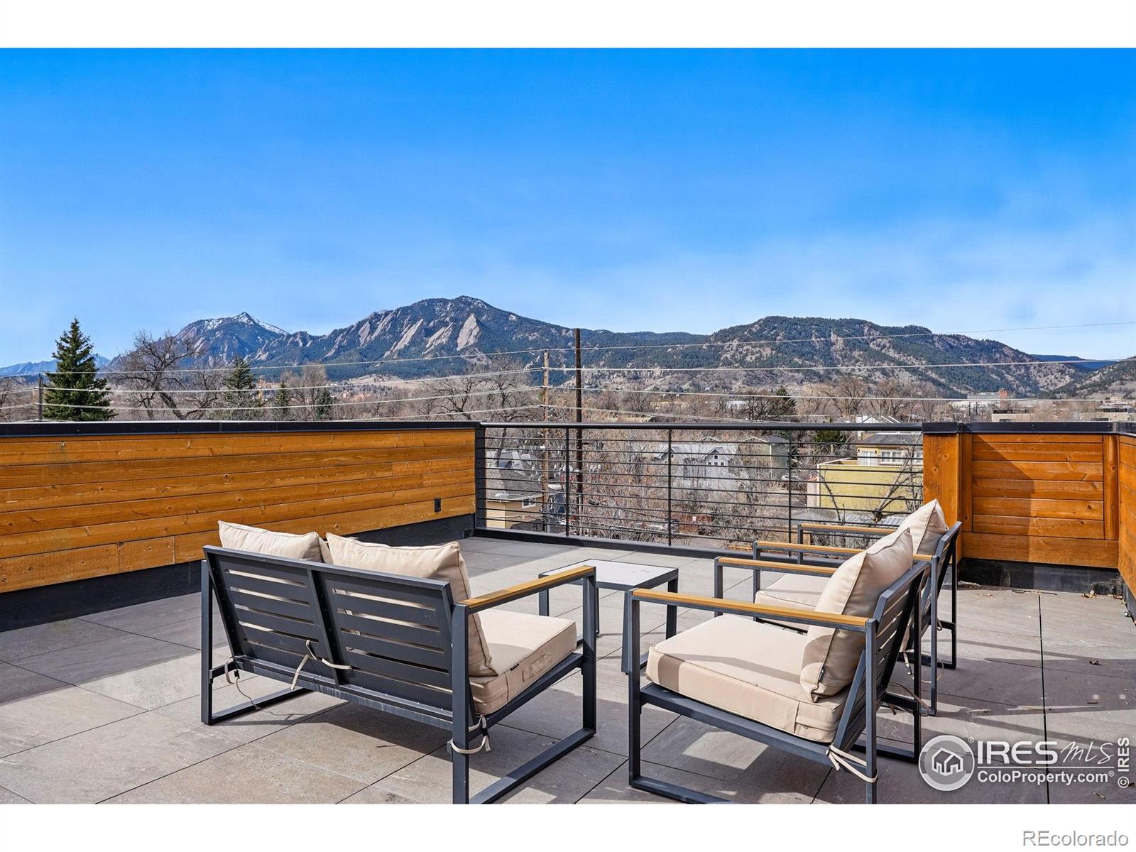 VIEWS, GLORIOUS VIEWS! You can have it all with this lock and go luxury condo in this sought after private enclave located just off Pearl Street. Located in the The Mark, this boutique collection of 8 residences along Boulder's vibrant Pearl Street is just seconds from world-class dining and shopping. This stunning 3-bedroom, 3 1/2 bathroom residence includes two primary suites, a one car garage, and a spacious open floor plan with luxury finishes throughout. The gourmet kitchen is equipped with Thermador appliances, custom cabinetry, and sleek quartz countertops. One primary suite features a large walk-in closet and a luxurious ensuite bath with a walk-in shower and private deck to take in the westerly views. Multiple outdoor spaces beckon you from indoors to outdoors, including a rooftop deck with 360-degree views. This stellar location is private and quiet, yet just off of Pearl Street so you can head to Frasca or see what cool new styles just came in to Weekends. You'll enjoy Boulder's top hiking trails and equal proximity to the Pearl Street Mall as well as 29th Street Mall. If you're looking for an active lifestyle, low maintenance living, A+ location, and luxury living - look no more! Amazing options for rental as well. LIVE BOLDER, LOVE BOULDER!
