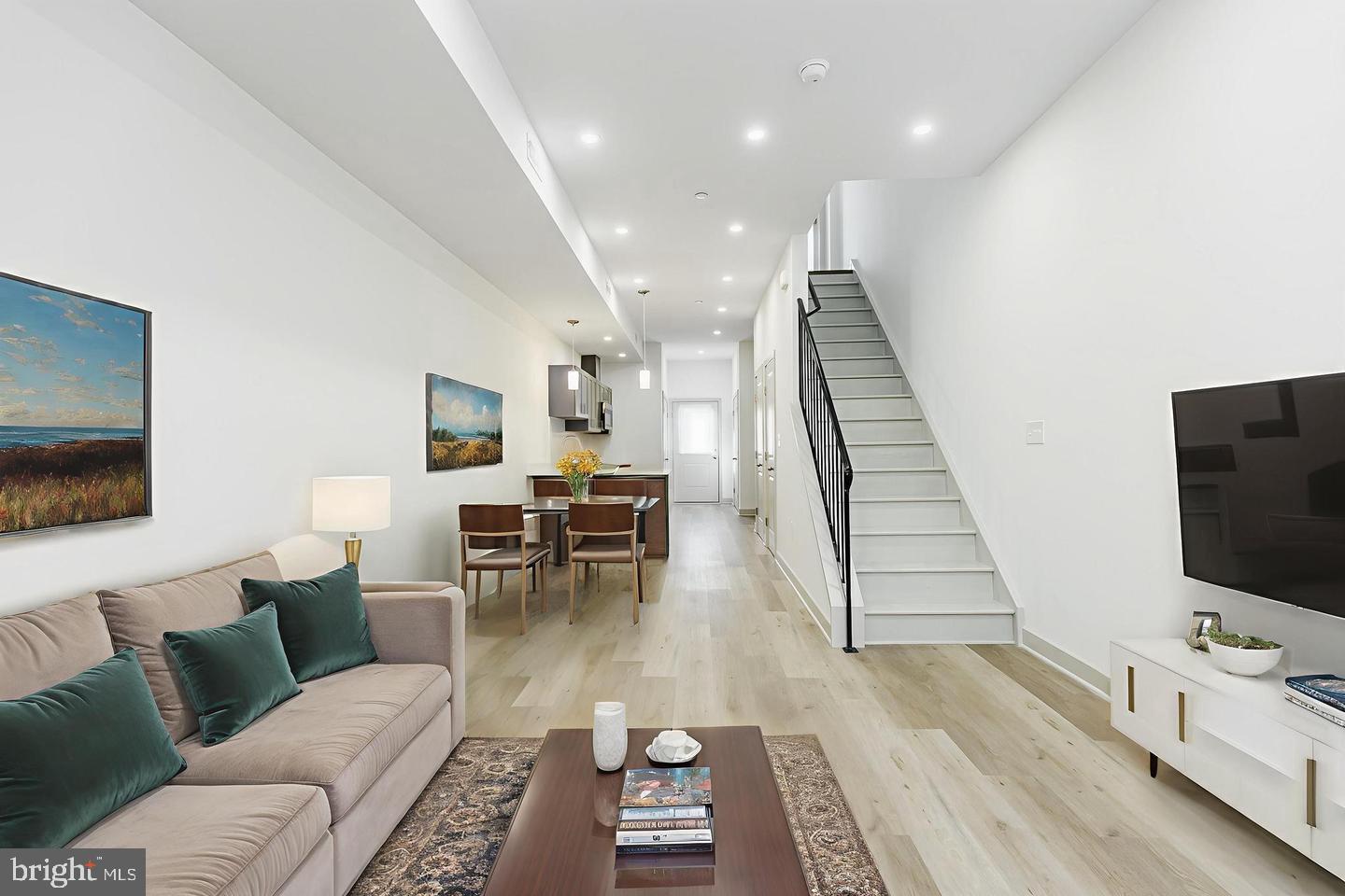 Welcome to 714 N Shedwick Street, a brand-new construction home offering a rare opportunity for affordable homeownership through the Mount Vernon Manor Community Land Trust, located in the heart of Philadelphia’s Mantua neighborhood. Thoughtfully designed with modern finishes and quality craftsmanship, this newly built home delivers comfortable, stylish living while supporting long-term housing affordability in a community-oriented setting.This move-in-ready residence features two bedrooms and two full bathrooms, with an open-concept living and dining area that flows seamlessly into a modern kitchen. The kitchen is equipped with real wood cabinetry, granite countertops, stainless steal appliances and contemporary fixtures, while the home also includes central air conditioning and energy-efficient systems throughout. Clean lines, modern finishes, and a functional layout make this home both attractive and practical for everyday living.The location offers easy access to public transportation, with nearby bus routes and convenient connections to Center City and surrounding neighborhoods. Residents will enjoy close proximity to neighborhood parks, recreation spaces, and a nearby community garden, offering a welcoming place to connect with neighbors and enjoy green space. The home is also just minutes from the Philadelphia Zoo, Drexel University, and the University of Pennsylvania, making it ideal for those seeking convenient access to major institutions while remaining rooted in a residential neighborhood.Mantua is a historic West Philadelphia community experiencing thoughtful, community-driven growth, known for its strong neighborhood pride, local engagement, and proximity to Fairmount Park and University City amenities. A growing selection of local restaurants, cafes, and everyday conveniences can be found nearby, adding to the area’s walkable appeal.Offered through a Community Land Trust (CLT), this home is available at a below-market purchase price to income-qualified buyers. The CLT structure allows homeowners to build equity over time while preserving long-term affordability and community stability. The property is intended for owner-occupants only, and resale restrictions apply as part of the program. Buyer must meet income eligibility requirements and complete the Community Land Trust approval process prior to purchase.