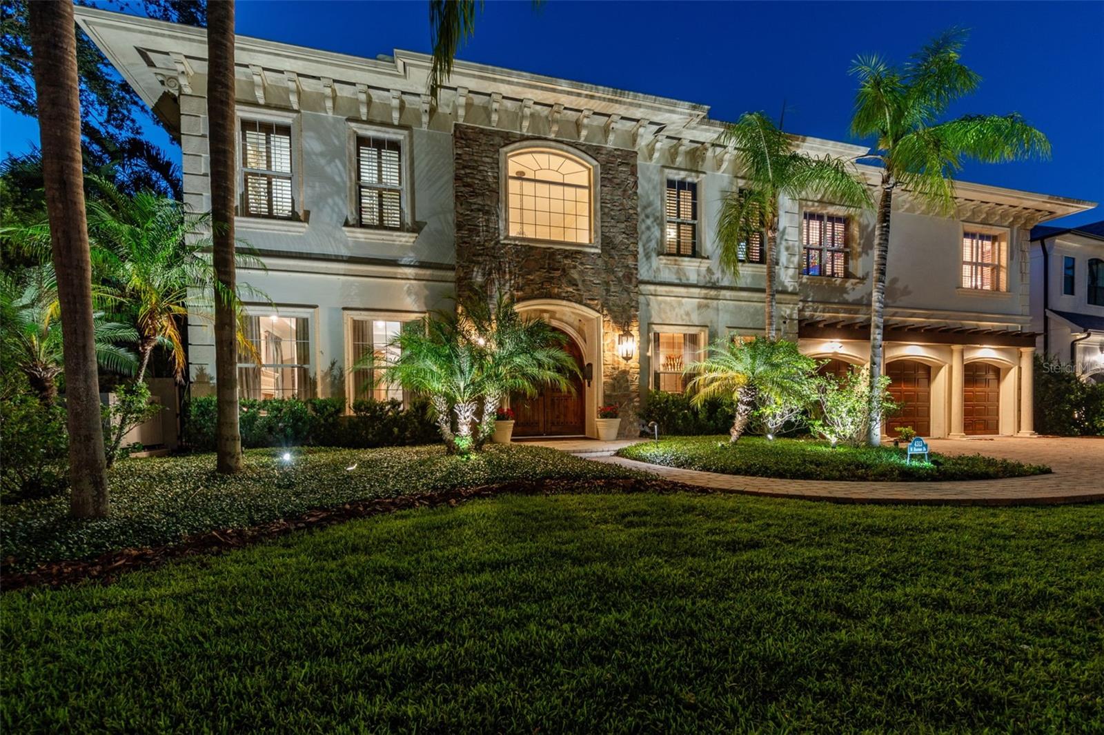 Under contract-accepting backup offers. Welcome Home to 4313 W Beachway Drive.  This luxurious BLOCK ON BLOCK construction home is located in the desirable Beach Park.   Posh designer touches separate it from others: 10' ceilings on both floors, 380 BOTTLE WINE CELLAR, custom decorative woodwork. The gourmet kitchen will please the most discerning chef with WOLF/SUB-ZERO appliances and TWO Bosch DISHWASHERS, pot filler. An enormous 1st FLOOR BEDROOM w/ensuite bath has an additional entrance/exit from the side of the house could be an in-law suite. Enjoy the SALTWATER POOL & OVERSIZED BACKYARD while entertaining year round on the 750 sqft lanai with retractable PHANTOM SCREENS. The lanai is equipped with fireplace & multiple dining/seating areas next to the OUTDOOR KITCHEN. Upstairs through double doors is the Master Suite with sitting area that offers a grand view of the 2nd floor screened-in balcony overlooking the pool. The spacious master bath has dual vanities, his & her wardrobe, and water closets. The second floor also includes 3 additional bedrooms, a laundry room, and a 24’ x 19’ BONUS ROOM with en-suite bathroom ready to be your media room/playroom/man cave, or SIXTH bedroom. (6th bedroom per tax records.) Take advantage of the additional 750 sqft of screened in outdoor living space on the second floor balcony. All the "extras" included: Osmosis Drinking system, Plantation Shutters, Custom Wood Closets. Feel secure with the home’s video security system and a Generac whole house generator, 2 HVAC's (2019), Tankless Water Heater (2017), Water Softener (2018), Roof (2022), Minutes to TGH, International Mall, Westshore, Downtown, Airport, Beaches, and Tampa Stadium.