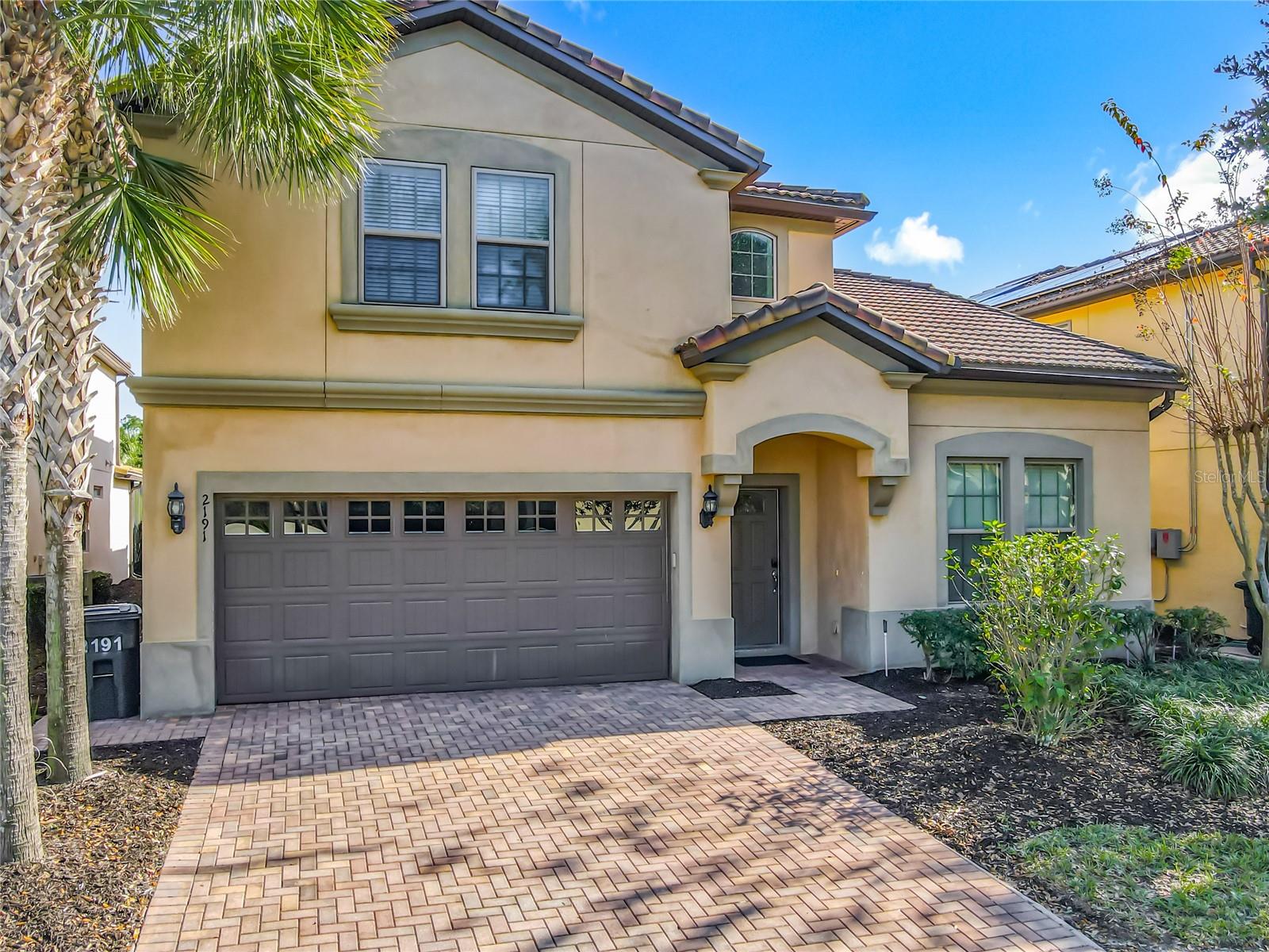 Buyer shall assume the existing solar contract at closing.  Beautifully and tastefully decorated, this exceptional 8-bedroom, 6-bath single-family pool home is located within the highly sought-after Windsor at Westside Resort, one of the premier resort communities in the Orlando/Kissimmee area. Enjoy convenient access to world-class theme parks, dining, shopping, and entertainment. The home features a fully equipped kitchen with stainless steel appliances, granite countertops, and custom cabinetry, along with stylish furnishings and décor throughout. All furniture, décor, and appliances are included, making this a truly turnkey opportunity. Whether used as a vacation rental, a seasonal getaway, or a personal vacation home, this property offers outstanding flexibility. Owners and guests enjoy access to resort-style amenities, including a 10,000-square-foot clubhouse, state-of-the-art fitness center, expansive resort pool with splash area, and a relaxing lazy river. Additional amenities include Tu Casa Bar & Lounge, market and deli, concierge services, sand volleyball court, multi-purpose sports courts, a small soccer field, and playground—all designed to deliver a true resort lifestyle.