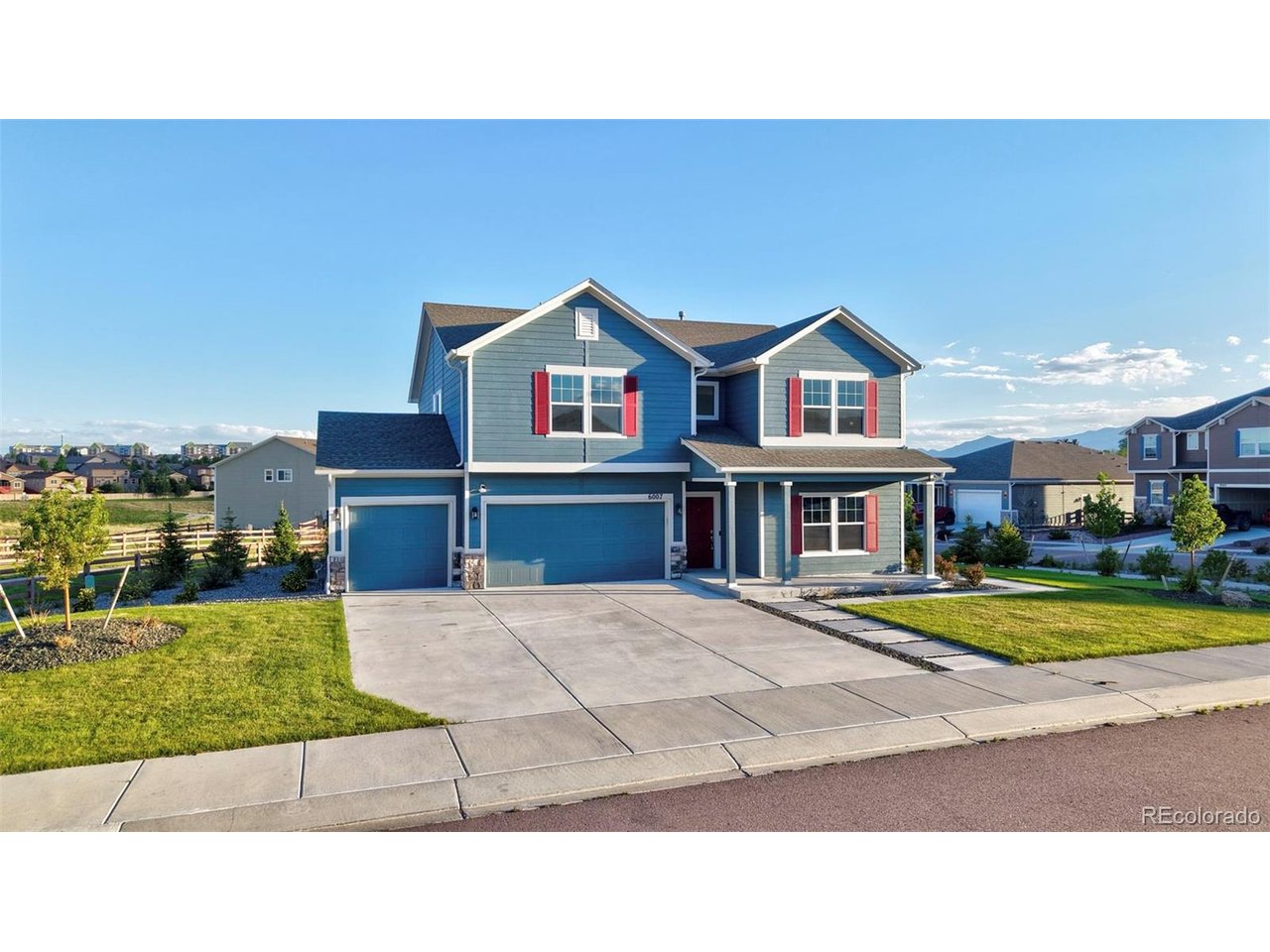 Welcome to this stunning 2-story home in the highly sought-after Westcreek at Wolf Ranch community of Colorado Springs! Offering the perfect blend of modern design, functional living space, and valuable upgrades, this move-in-ready home stands out from nearby new construction opportunities. Featuring 3 bedrooms, 3 bathrooms, a spacious dedicated office, and an oversized 3-car garage, this home provides flexibility for remote work, growing families, entertaining, and everyday living. The open-concept floor plan is highlighted by beautiful luxury vinyl plank flooring throughout the main level, upgraded light fixtures, and abundant natural light. The gourmet kitchen is designed to impress with granite countertops, white cabinetry, stainless steel appliances, ample counter space, and a layout that seamlessly connects to the dining and living areas, making it ideal for hosting guests or enjoying family time. Upstairs, you'll find a large additional living space and comfortable bedrooms with new carpet. The spacious primary suite offers a private retreat with an en-suite bathroom and a large walk-in closet. A significant advantage of this property is the fully landscaped front and backyard, a feature rarely found in surrounding new-build homes and one that can save buyers tens of thousands of dollars in additional landscaping expenses. Step outside to enjoy the expansive custom concrete patio, perfect for outdoor dining, relaxing, and entertaining while taking in breathtaking Pikes Peak and Front Range mountain views. Located in the desirable Wolf Ranch area, enjoy convenient access to parks, trails, schools, shopping, dining, and major commuting routes while still experiencing the beauty and lifestyle Colorado is known for. Why wait months for a new build and then spend additional money on landscaping and outdoor improvements when this home already has it all?? Be sure to check out the video walkthrough and experience everything this exceptional home has to offer!